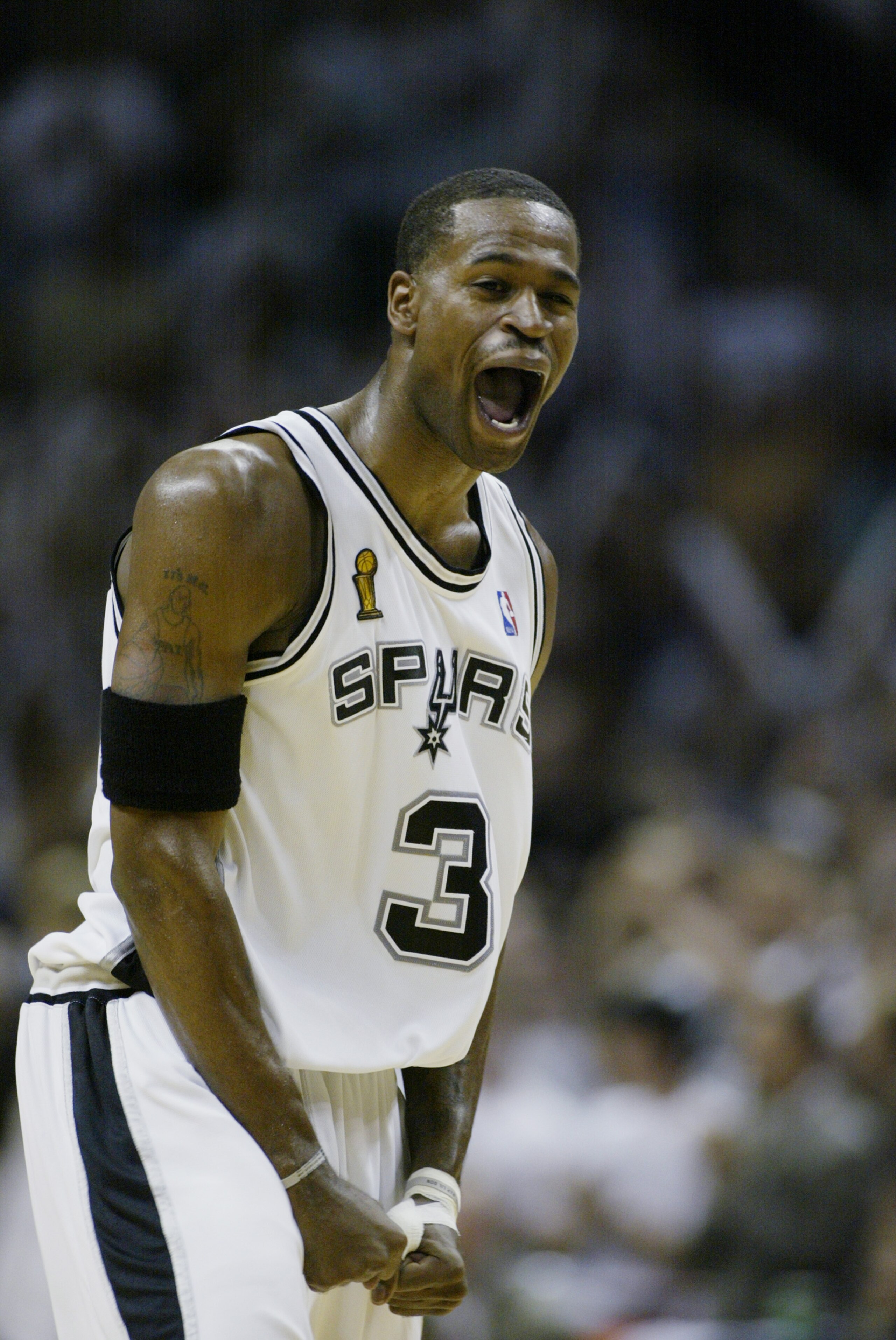 SAN ANTONIO, TX - JUNE 15:  Stephen Jackson #3 of the San Antonio Spurs celebrates in Game six of the 2003 NBA Finals against the New Jersey Nets on June 15, 2003 at the SBC Center in San Antonio, Texas.  The Spurs won 88-77 and defeated the Nets to win t