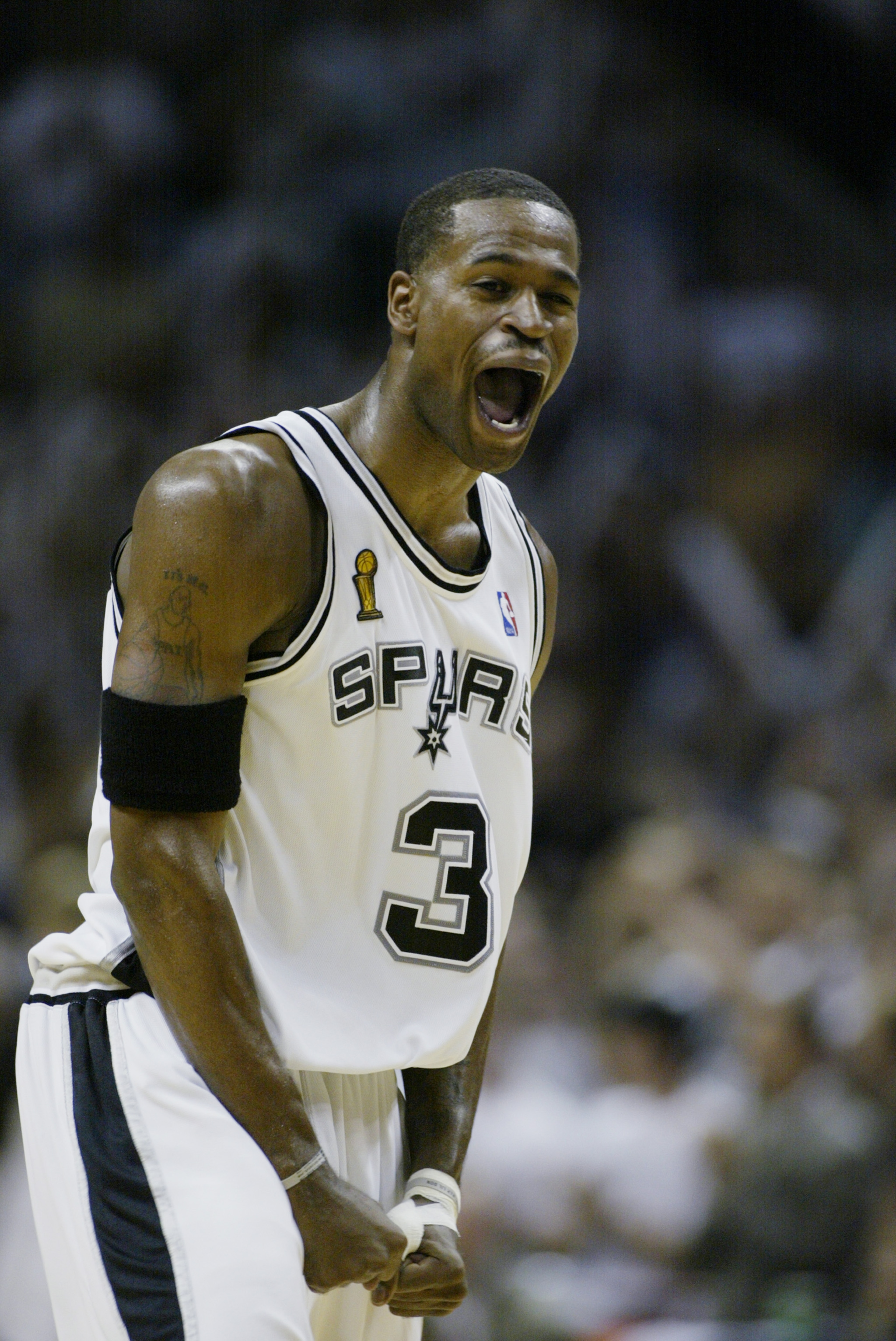 SAN ANTONIO, TX - JUNE 15:  Stephen Jackson #3 of the San Antonio Spurs celebrates in Game six of the 2003 NBA Finals against the New Jersey Nets on June 15, 2003 at the SBC Center in San Antonio, Texas.  The Spurs won 88-77 and defeated the Nets to win t