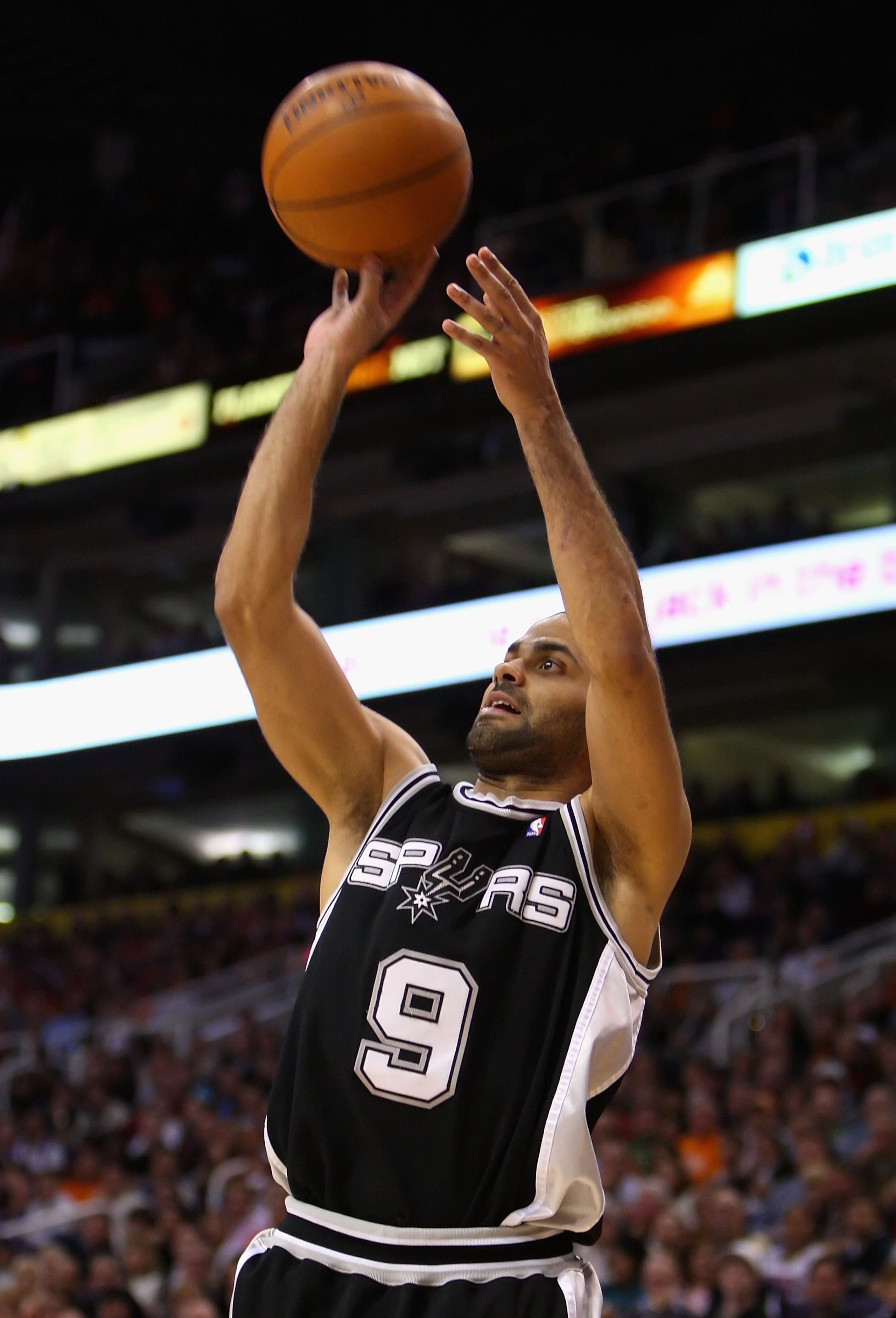 PHOENIX - DECEMBER 15:  Tony Parker #9 of the San Antonio Spurs puts up a shot during the NBA game against the Phoenix Suns at US Airways Center on December 15, 2009 in Phoenix, Arizona. The Suns defeated the Spurs 116-104. NOTE TO USER: User expressly ac