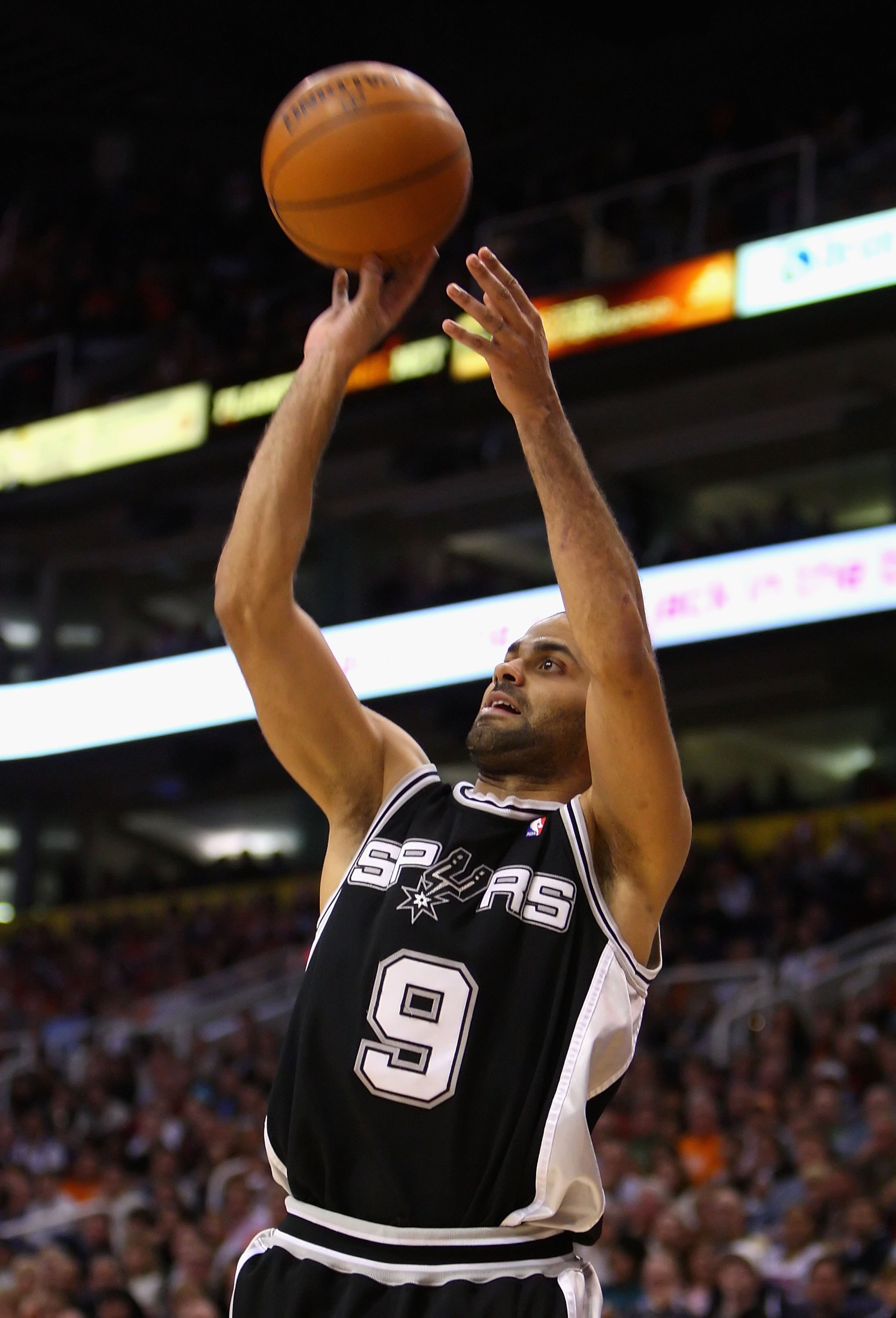 PHOENIX - DECEMBER 15:  Tony Parker #9 of the San Antonio Spurs puts up a shot during the NBA game against the Phoenix Suns at US Airways Center on December 15, 2009 in Phoenix, Arizona. The Suns defeated the Spurs 116-104. NOTE TO USER: User expressly ac