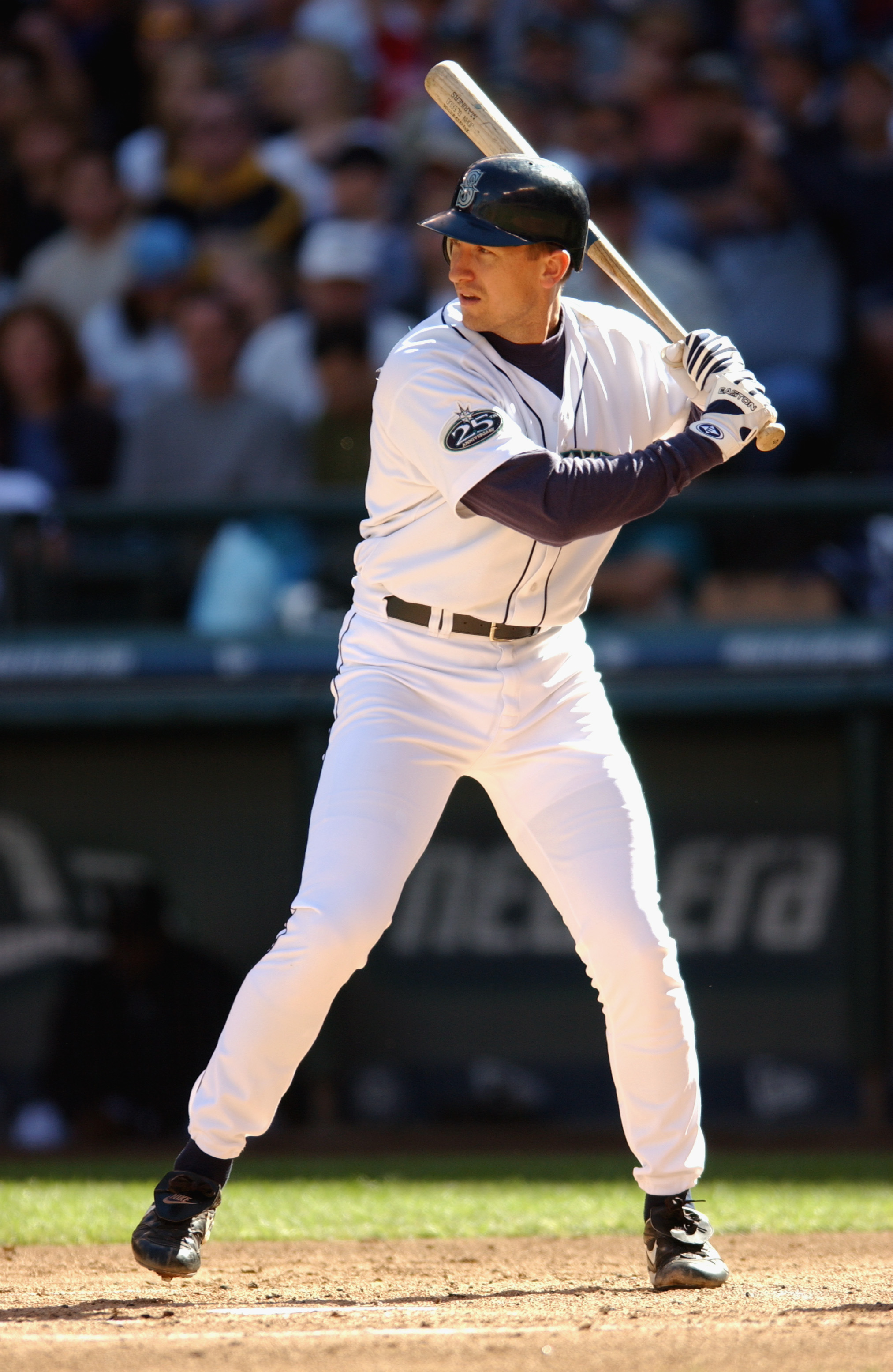 SEATTLE - SEPTEMBER 22:  First Baseman John Olerud #5 of the Seattle Mariners readies at the plate against the Anaheim Angels during the game on September 22, 2002 at Safeco Field in Seattle, Washington.  The Mariners defeated the Angels 3-2.  (Photo by O