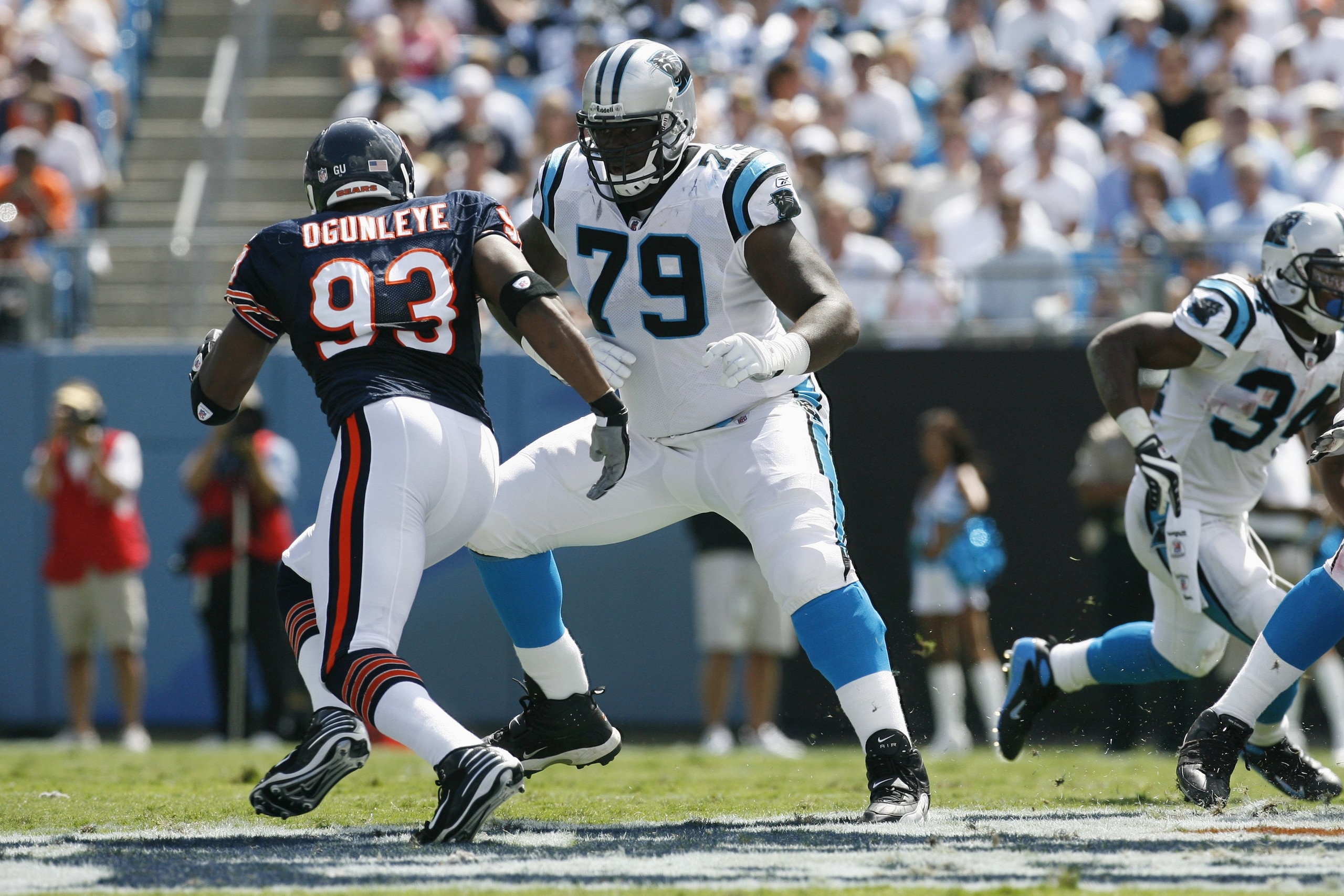 CHARLOTTE, NC - SEPTEMBER 14:  Jeff Otah #79 of the Carolina Panthers blocks against Adewale Ogunleye #93 of the Chicago Bears during the game at Bank of America Stadium on September 14, 2008 in Charlotte, North Carolina. (Photo by Kevin C. Cox/Getty Imag