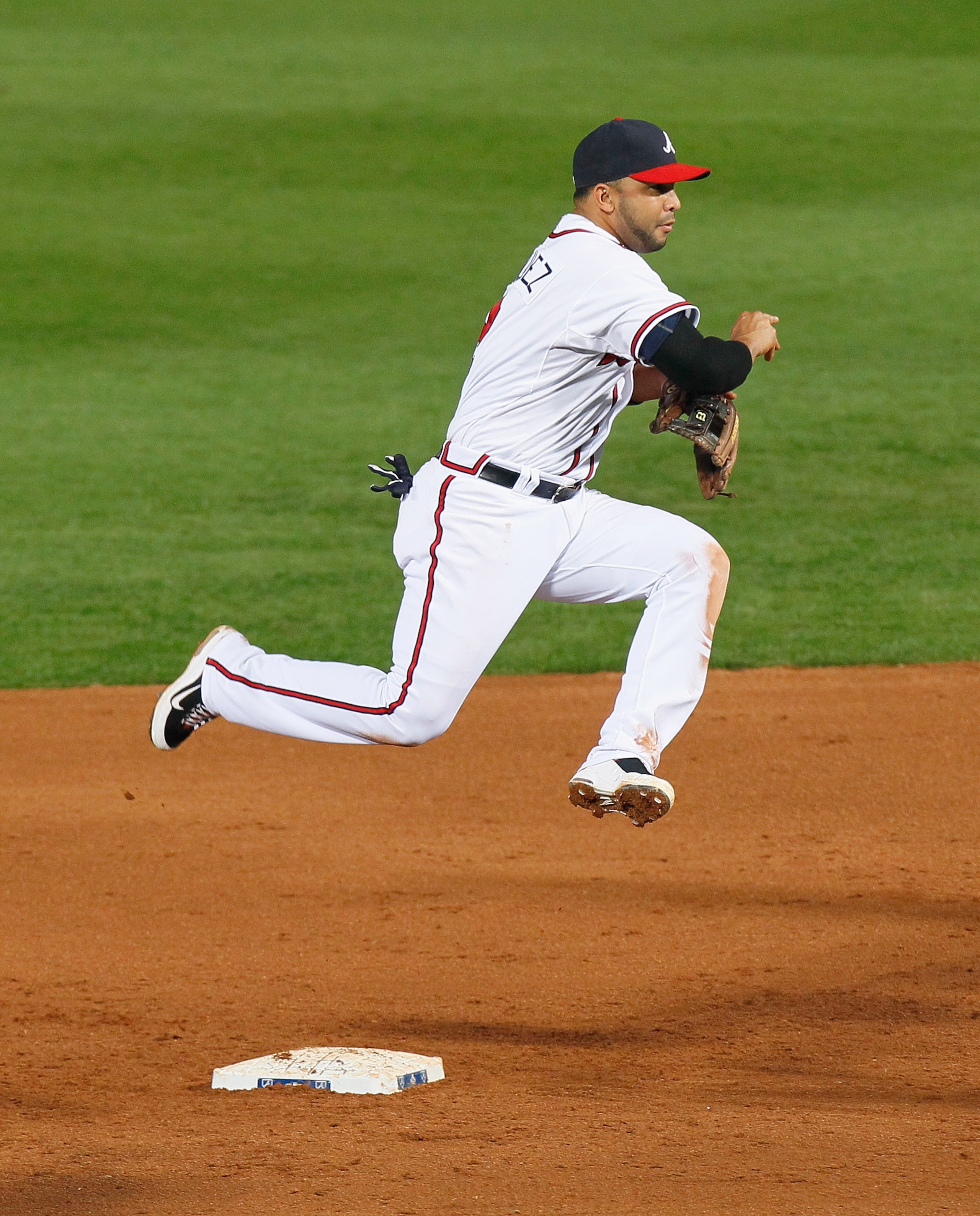 ATLANTA - OCTOBER 11:  Alex Gonzalez #2 of the Atlanta Braves against the San Francisco Giants during Game Four of the NLDS of the 2010 MLB Playoffs at Turner Field on October 11, 2010 in Atlanta, Georgia.  (Photo by Kevin C. Cox/Getty Images)