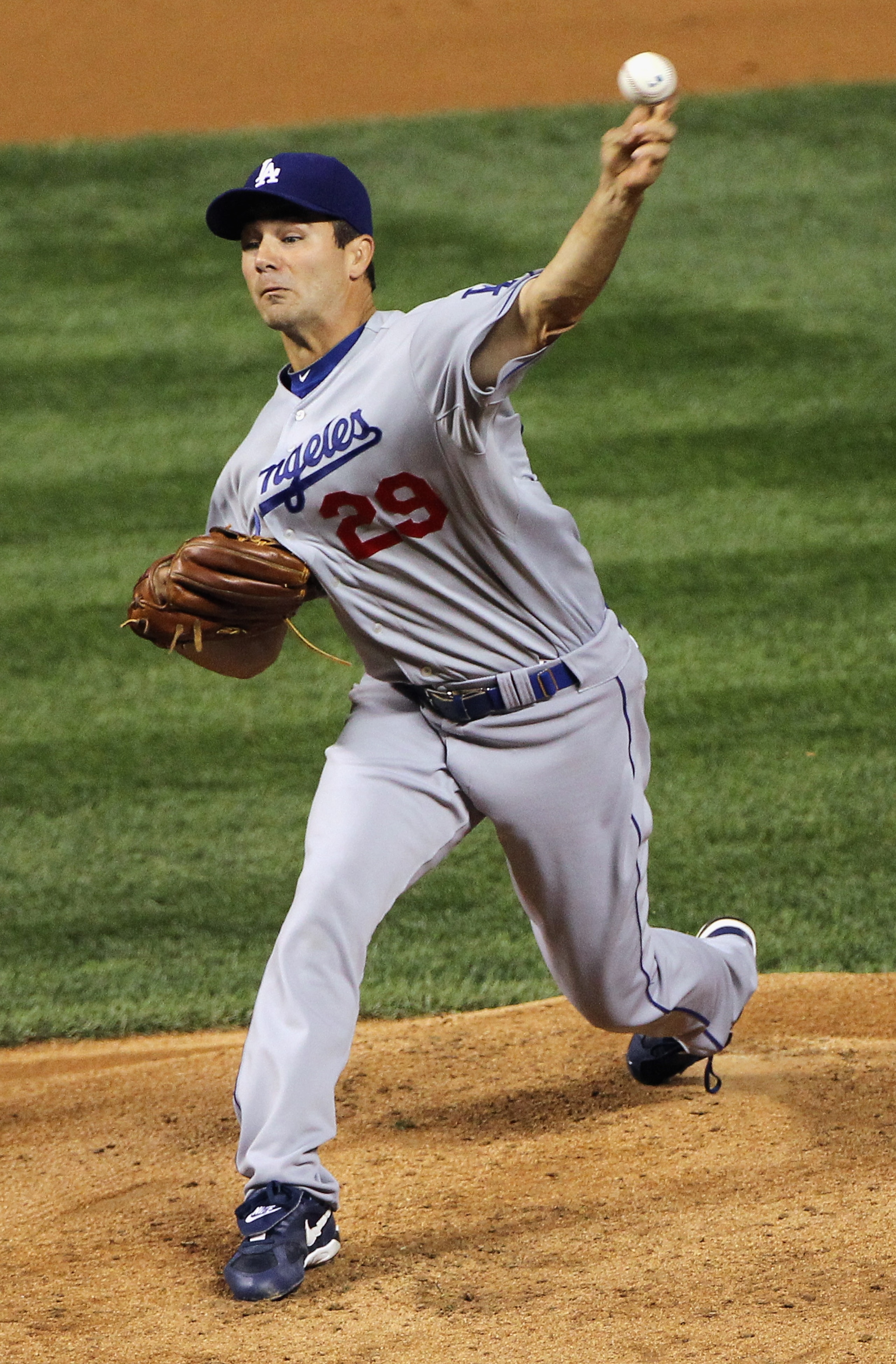 DENVER - SEPTEMBER 27:  Starting pitcher Ted Lilly #29 of the Los Angeles Dodgers delivers against the Colorado Rockies at Coors Field on September 25, 2010 in Denver, Colorado.  (Photo by Doug Pensinger/Getty Images)