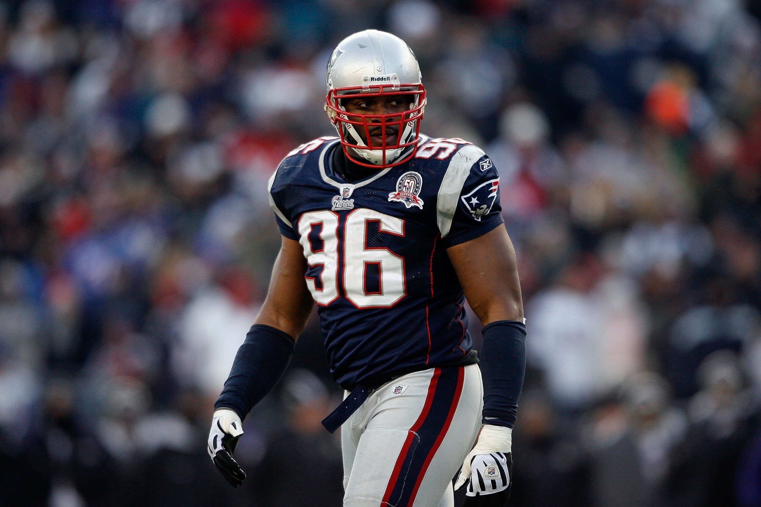 FOXBORO, MA - JANUARY 10: Adalius Thomas #96 of the New England Patriots looks on against the Baltimore Ravens during the 2010 AFC wild-card playoff game at Gillette Stadium on January 10, 2010 in Foxboro, Massachusetts. The Ravens won 33-14. (Photo by E FOXBORO, MA - JANUARY 10: Adalius Thomas #96 of the New England Patriots looks on against the Baltimore Ravens during the 2010 AFC wild-card playoff game at Gillette Stadium on January 10, 2010 in Foxboro, Massachusetts. The Ravens won 33-14. (Photo by E