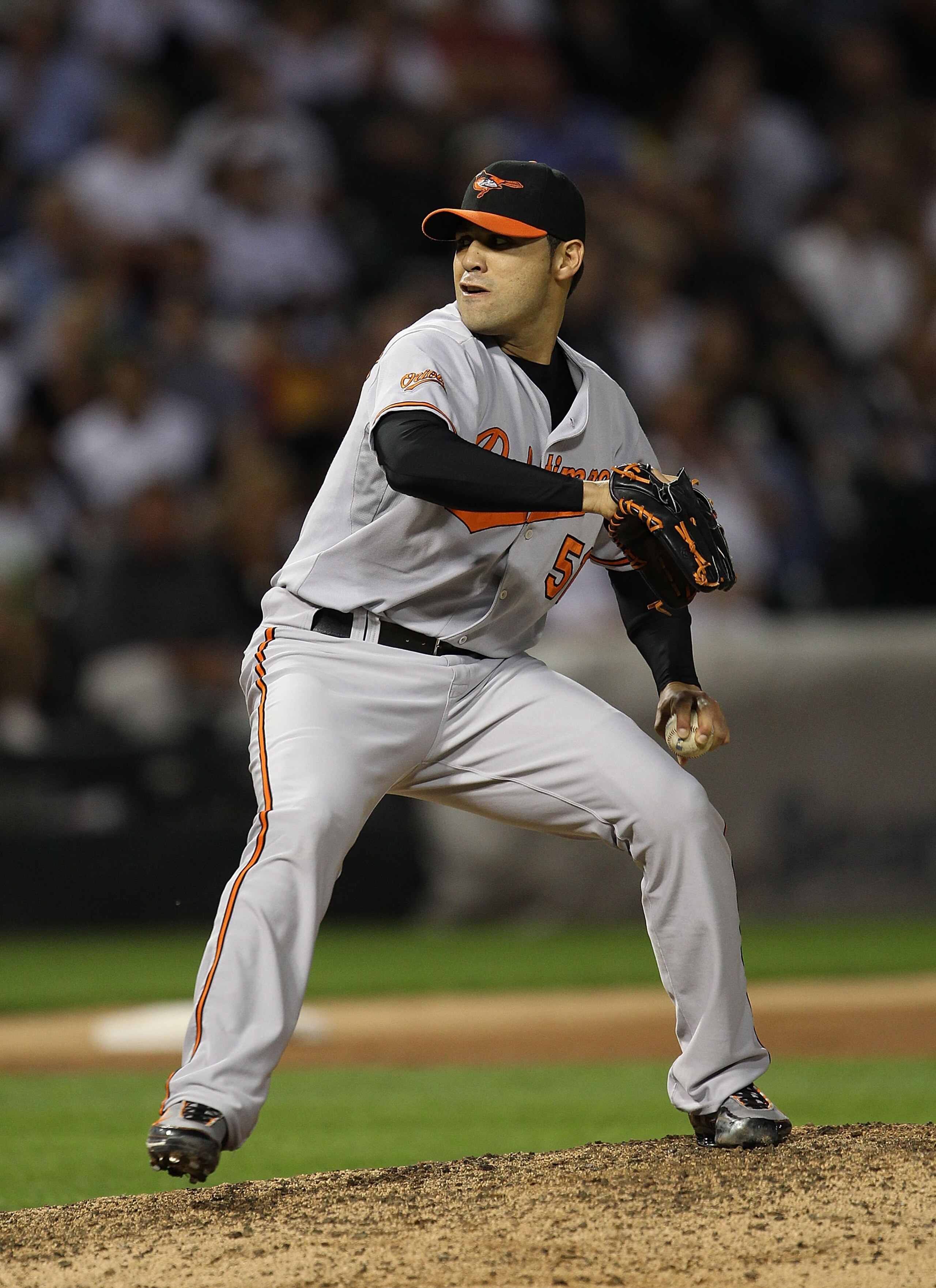 CHICAGO - AUGUST 25: Michael Gonzalez #51 of the Baltimore Orioles pitches against the Chicago White Sox at U.S. Cellular Field on August 25, 2010 in Chicago, Illinois. The Orioles defeated the White Sox 4-2. (Photo by Jonathan Daniel/Getty Images)