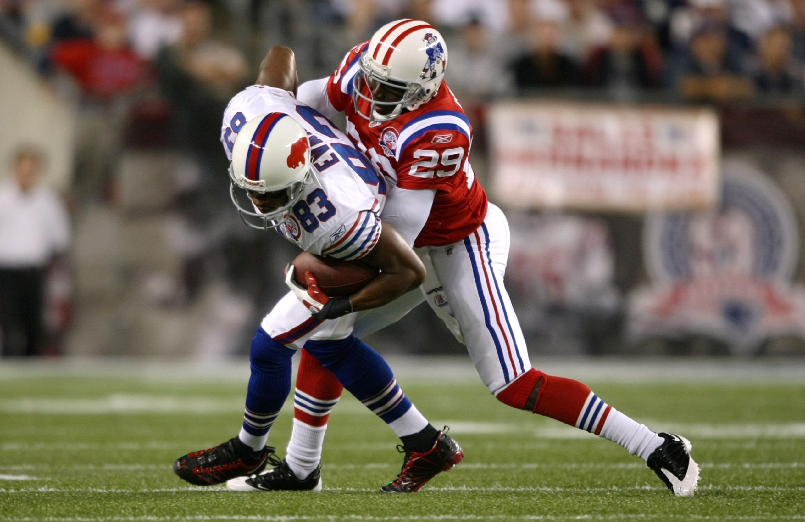 FOXBORO, MA - SEPTEMBER 14: Lee Evans #83 of the Buffalo Bills is tackled by Shawn Springs #29 of the New England Patriots on September 14, 2009 at Gillette Stadium in Foxboro, Massachusetts. (Photo by Elsa/Getty Images) FOXBORO, MA - SEPTEMBER 14: Lee Evans #83 of the Buffalo Bills is tackled by Shawn Springs #29 of the New England Patriots on September 14, 2009 at Gillette Stadium in Foxboro, Massachusetts. (Photo by Elsa/Getty Images)