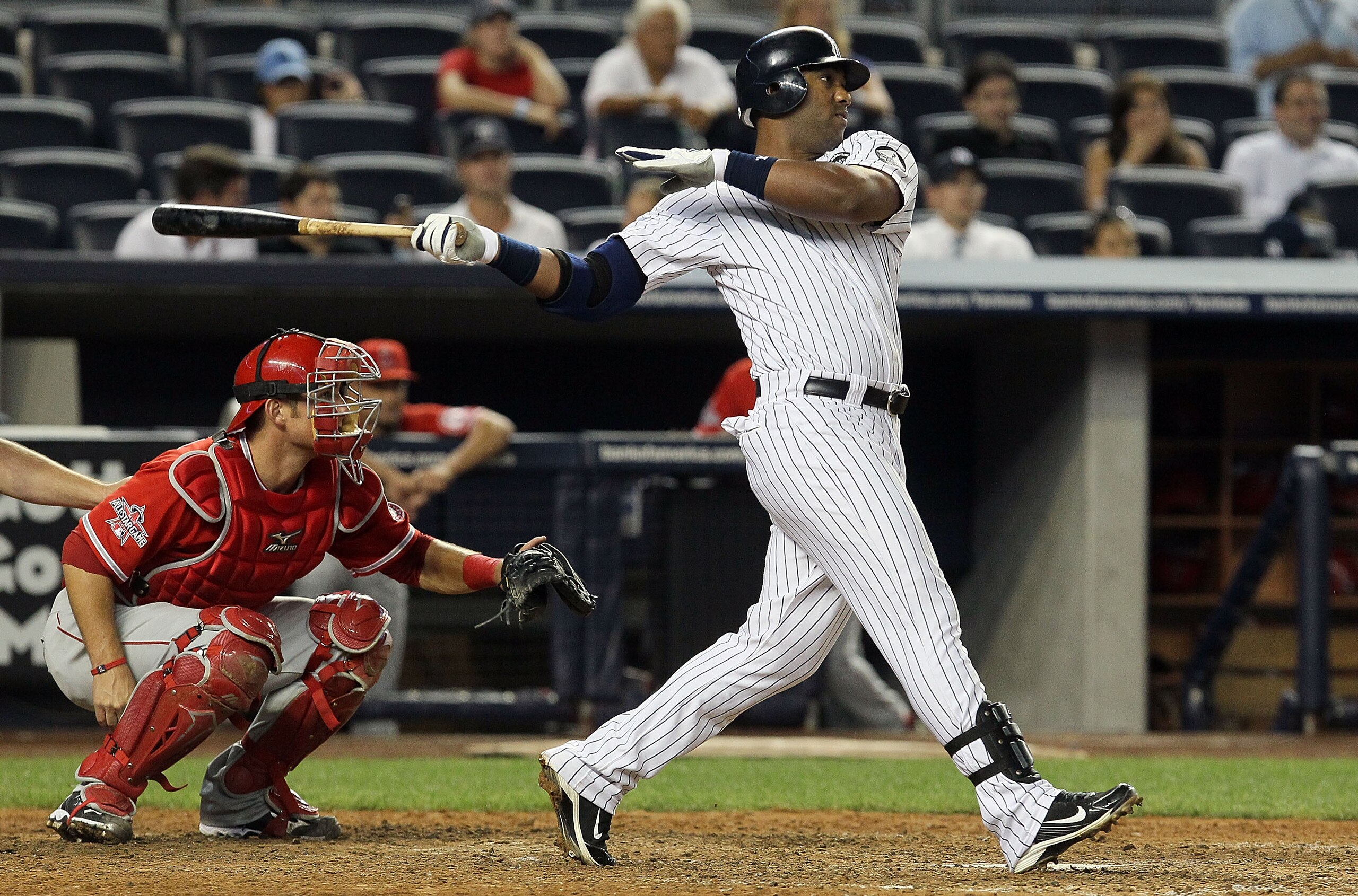 NEW YORK - JULY 20:  Juan Miranda #53 of the New York Yankees bats against the Los Angeles Angels of Anaheim on July 20, 2010 at Yankee Stadium in the Bronx borough of New York City. The Angels defeated the Yankees 10-2.  (Photo by Jim McIsaac/Getty Image