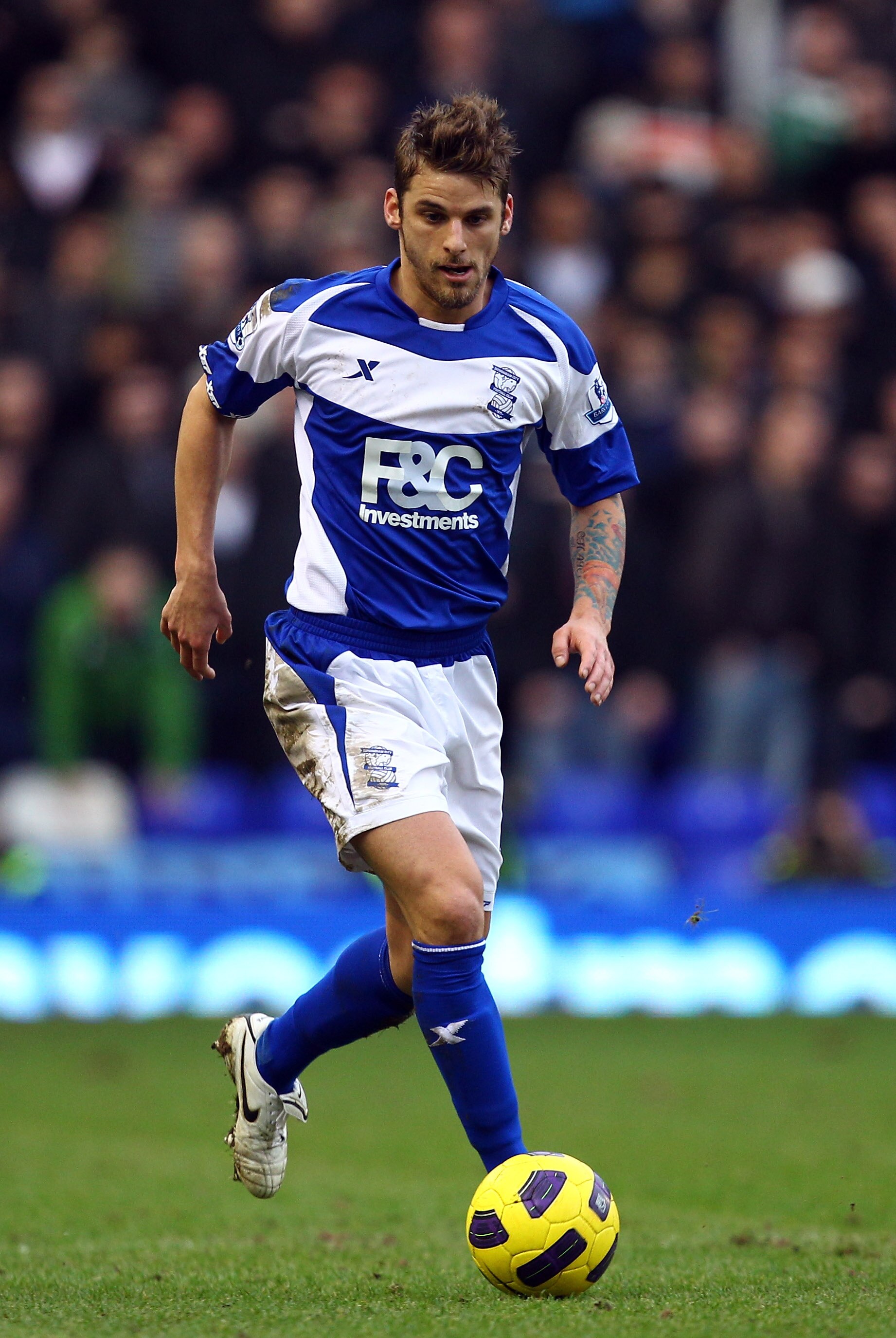 BIRMINGHAM, ENGLAND - JANUARY 16:  David Bentley of Birmingham in action during the Barclays Premier League match between Birmingham City and Aston Villa at St.Andrews on January 16, 2011 in Birmingham, England.  (Photo by Richard Heathcote/Getty Images)