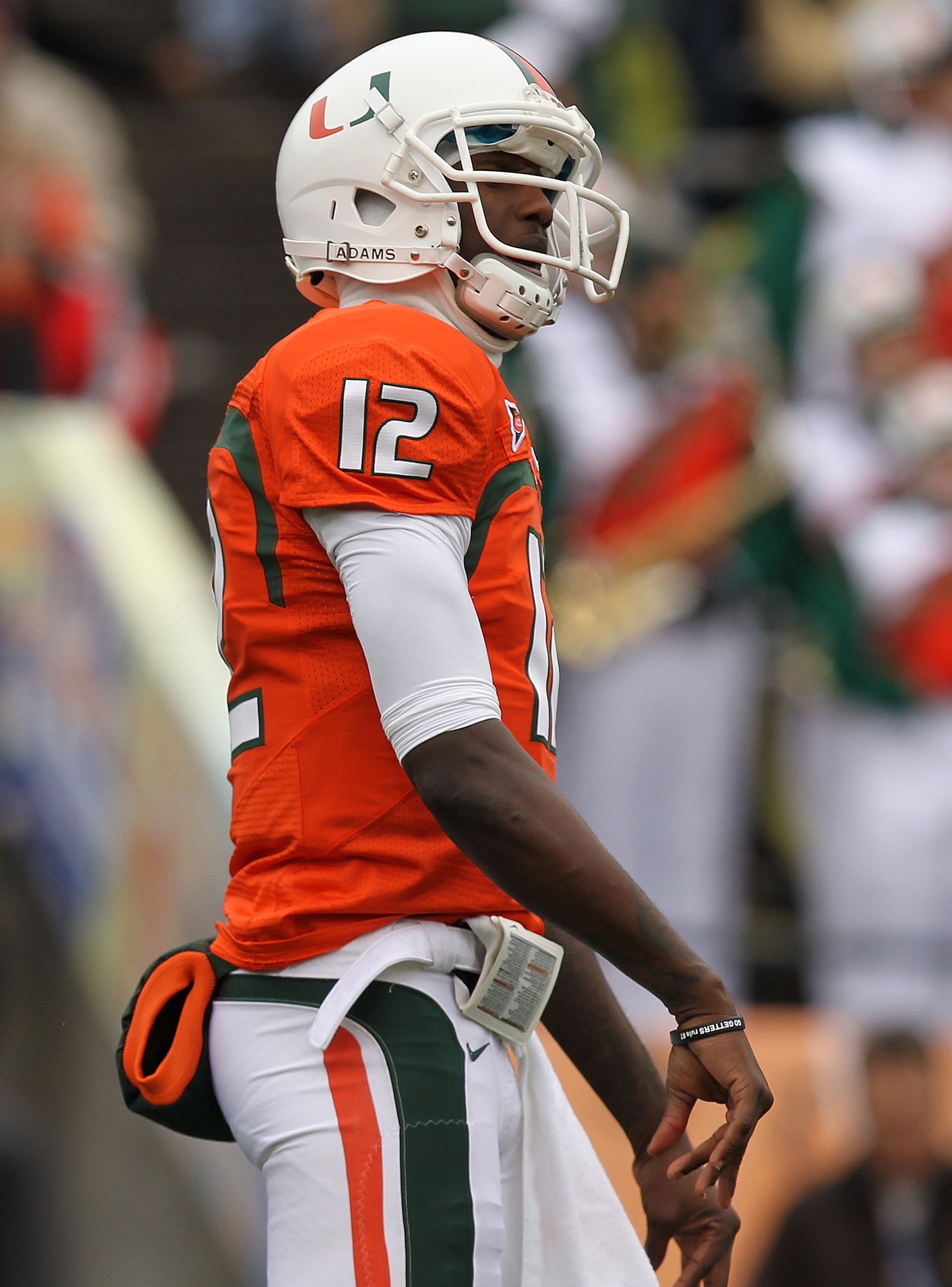 EL PASO, TX - DECEMBER 30:  Quarterback Jacory Harris #12 of the Miami Hurricanes reacts after a pass interception against the Notre Dame Fighting Irish during the Hyundai Sun Bowl at Sun Bowl on December 30, 2010 in El Paso, Texas.  (Photo by Ronald Mart