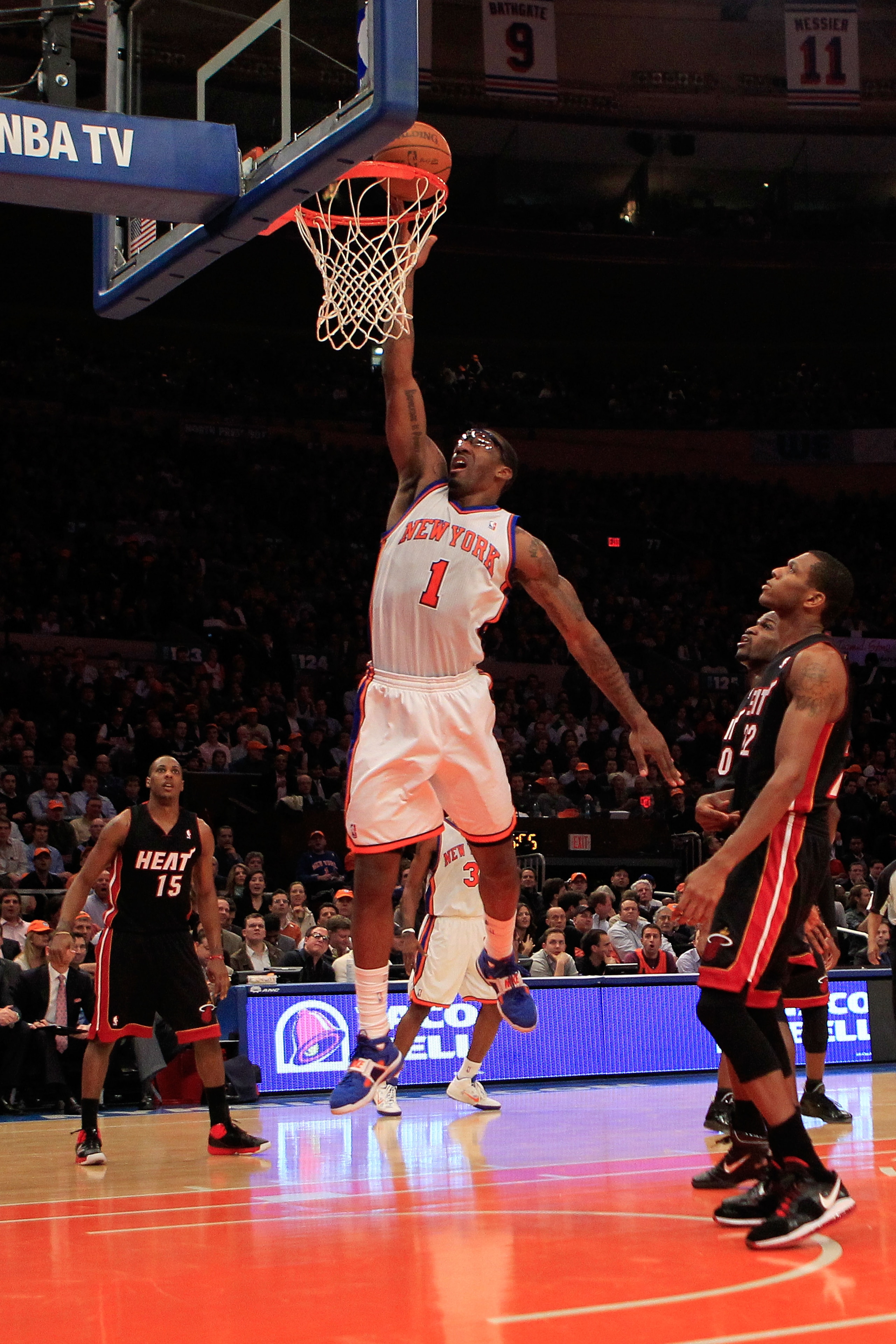 NEW YORK, NY - JANUARY 27: Amar'e Stoudemire #1 of the New York Knicks lays the ball up against the Miami Heat at Madison Square Garden on January 27, 2011 in New York City. NOTE TO USER: User expressly acknowledges and agrees that, by downloading and/or NEW YORK, NY - JANUARY 27: Amar'e Stoudemire #1 of the New York Knicks lays the ball up against the Miami Heat at Madison Square Garden on January 27, 2011 in New York City. NOTE TO USER: User expressly acknowledges and agrees that, by downloading and/or