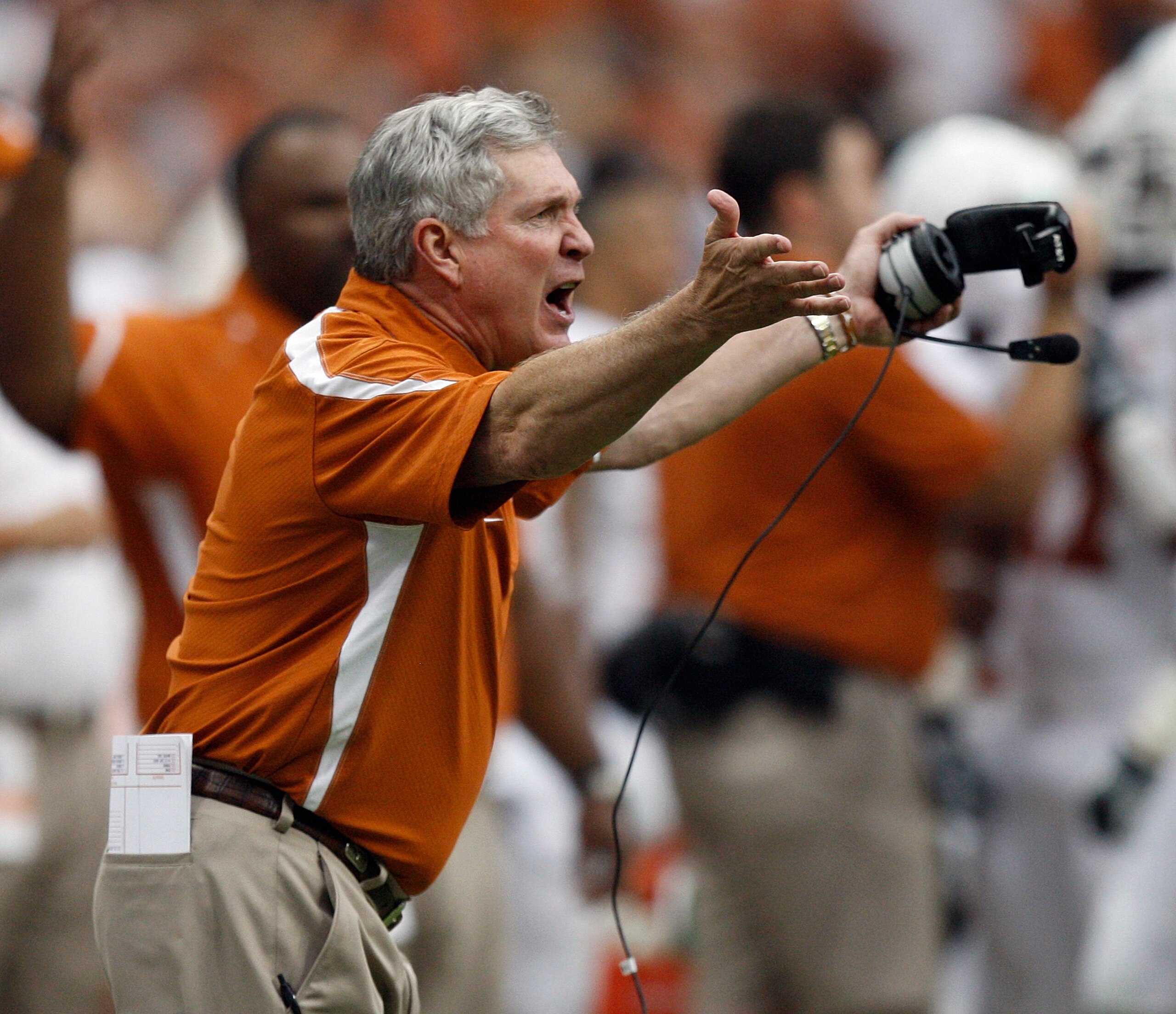 HOUSTON - SEPTEMBER 04:  Mack Brown, head coach of the Texas Longhorns yells at the officials after a delay of game was called in the third quarter during a game against the Rice Owls at Reliant Stadium on September 4, 2010 in Houston, Texas. Texas beat R
