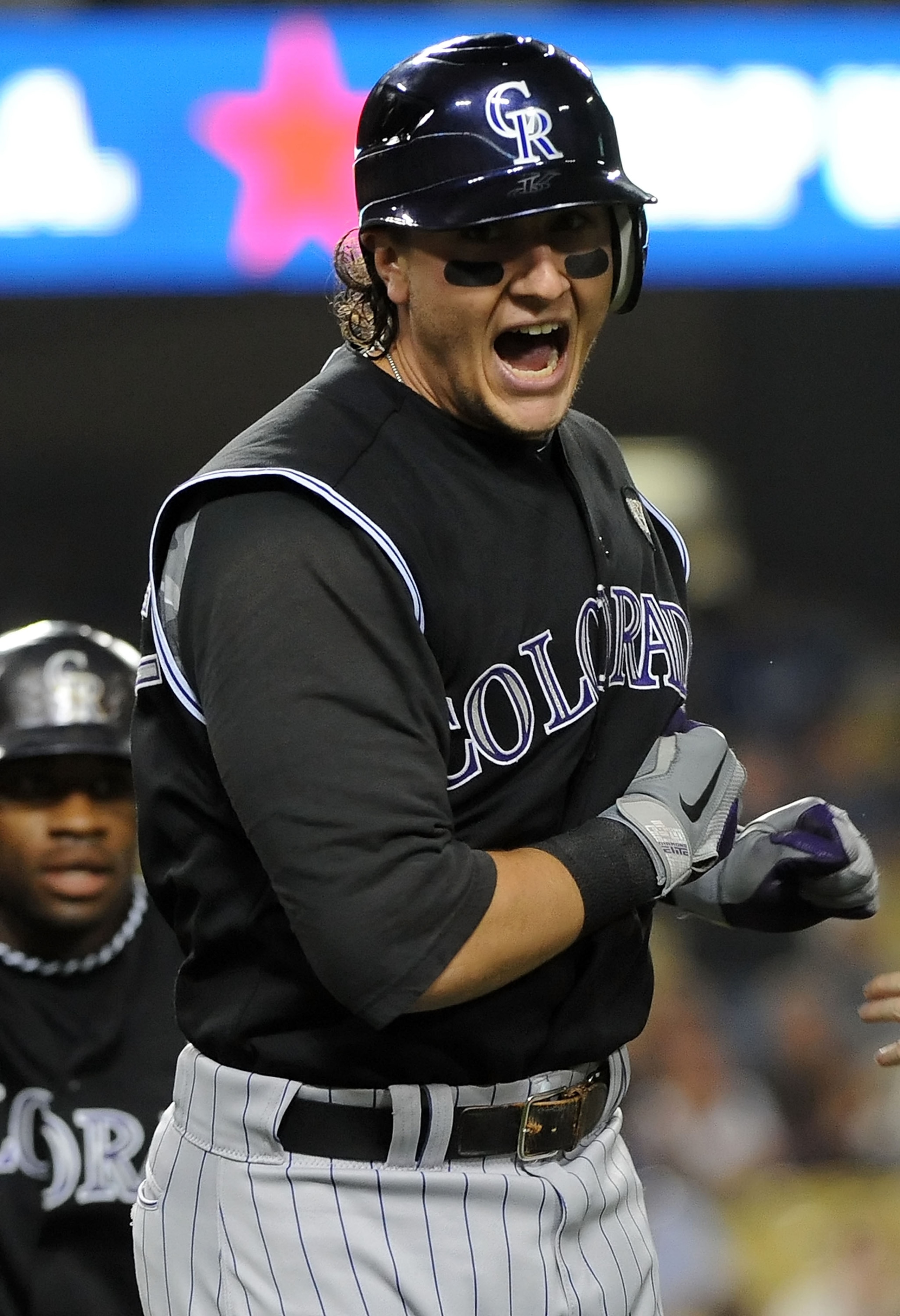 LOS ANGELES, CA - SEPTEMBER 17:  Troy Tulowitzki #2 of the Colorado Rockies celebrates after hitting a two run homerun in the first inning against the Los Angeles Dodgers at Dodger Stadium on September 17, 2010 in Los Angeles, California.  (Photo by Lisa