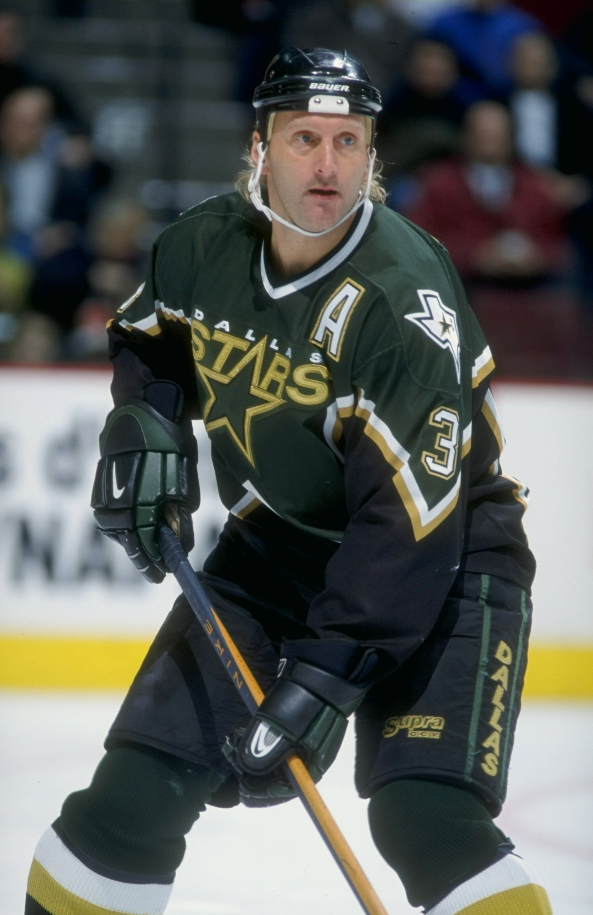 Derian Hatcher of the Dallas Stars celebrates with the Stanley Cup