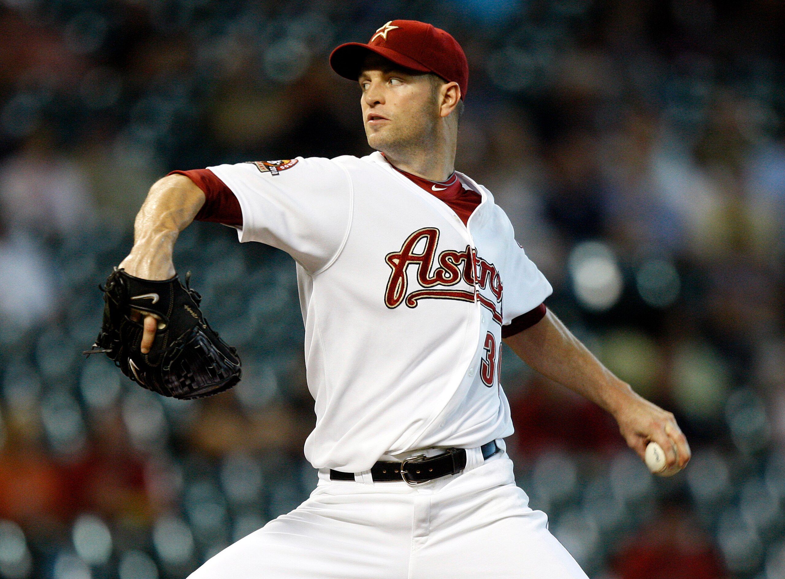 HOUSTON - SEPTEMBER 15:  Pitcher J.A. Happ #30 of the Houston Astros throws against the Milwaukee Brewers in the first inning at Minute Maid Park on September 15, 2010 in Houston, Texas.  (Photo by Bob Levey/Getty Images)
