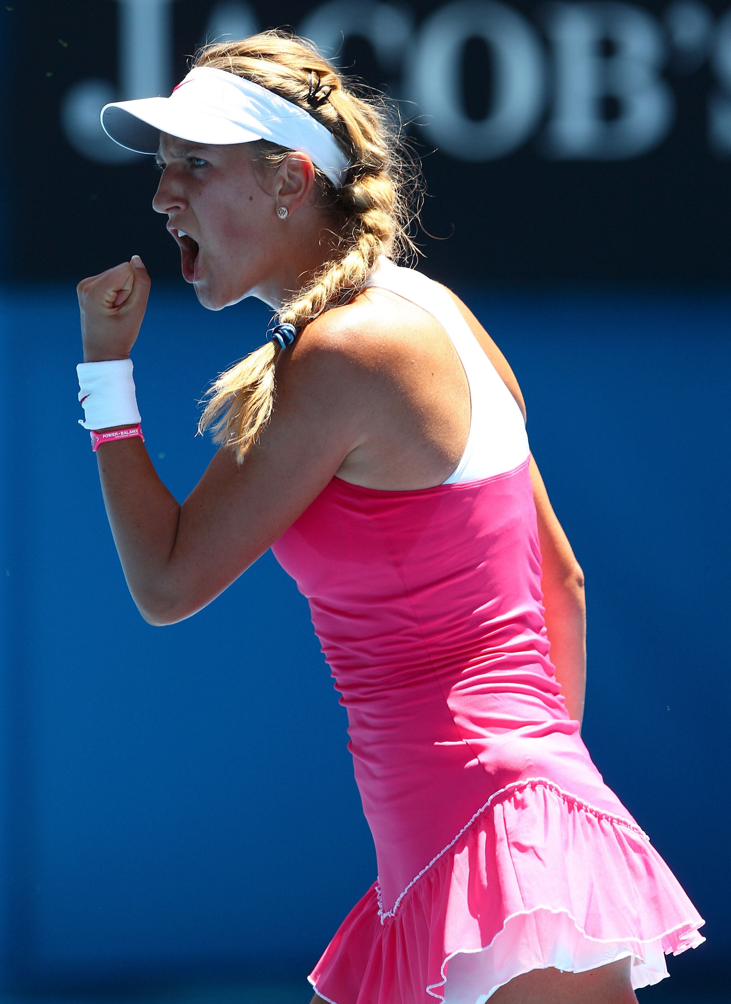 MELBOURNE, AUSTRALIA - JANUARY 23:  Victoria Azarenka of Belarus celebrates a point in her fourth round match against  Na Li of China during day seven of the 2011 Australian Open at Melbourne Park on January 23, 2011 in Melbourne, Australia.  (Photo by Ca