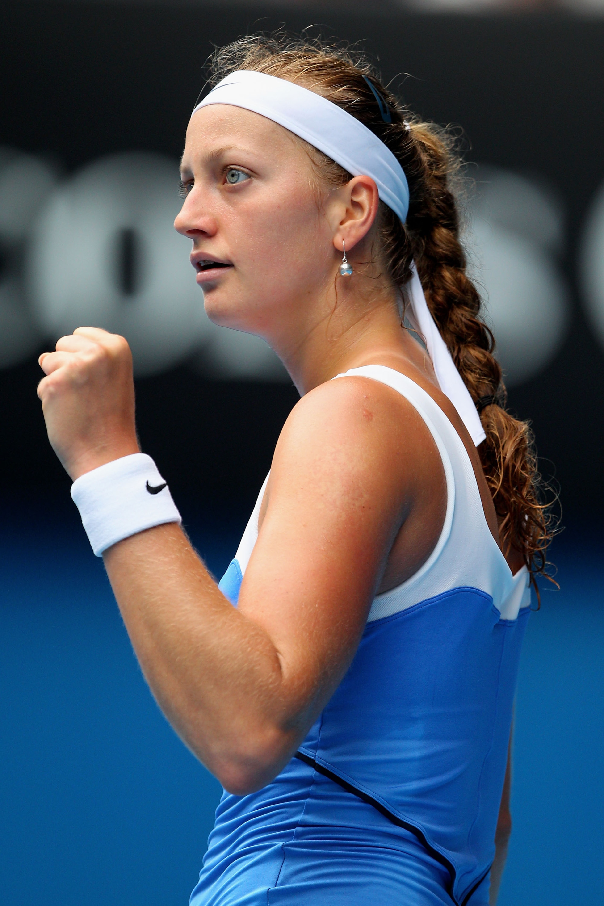 MELBOURNE, AUSTRALIA - JANUARY 26:  Petra Kvitova of the Czech Republic reacts in her quarterfinal match against Vera Zvonareva of Russia  during day ten of the 2011 Australian Open at Melbourne Park on January 26, 2011 in Melbourne, Australia.  (Photo by