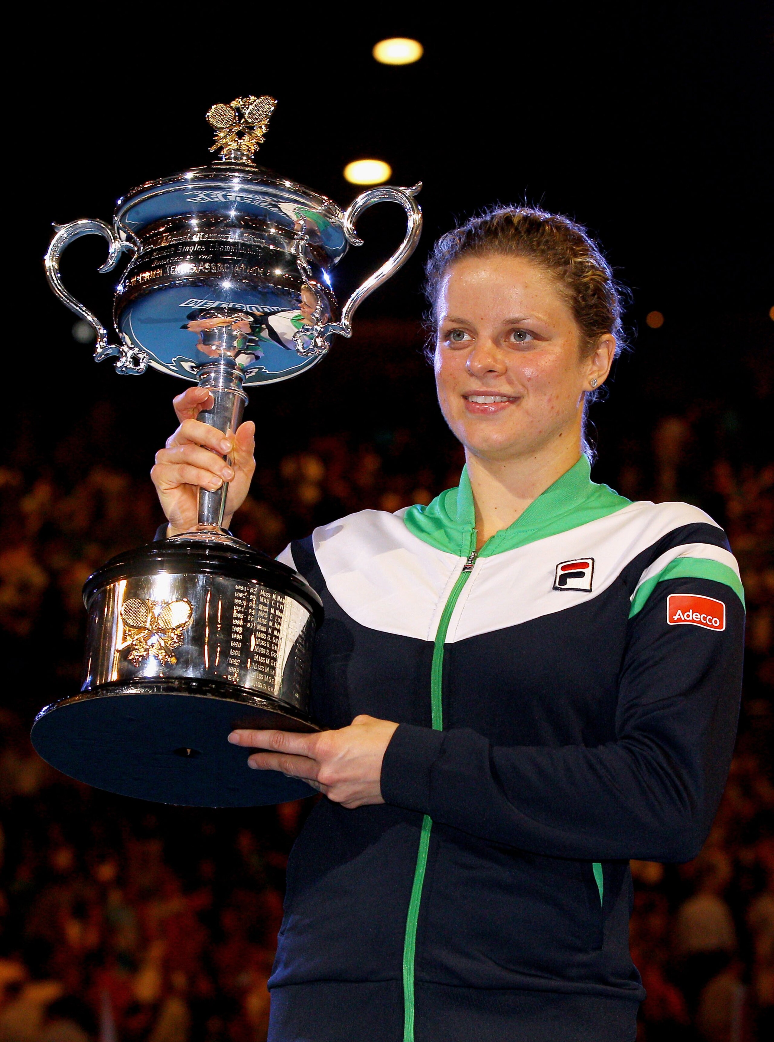 MELBOURNE, AUSTRALIA - JANUARY 29:  Kim Clijsters of Belgium poses with the Daphne Akhurst Trophy after winning her women's final match against Na Li of China during day thirteen of the 2011 Australian Open at Melbourne Park on January 29, 2011 in Melbour