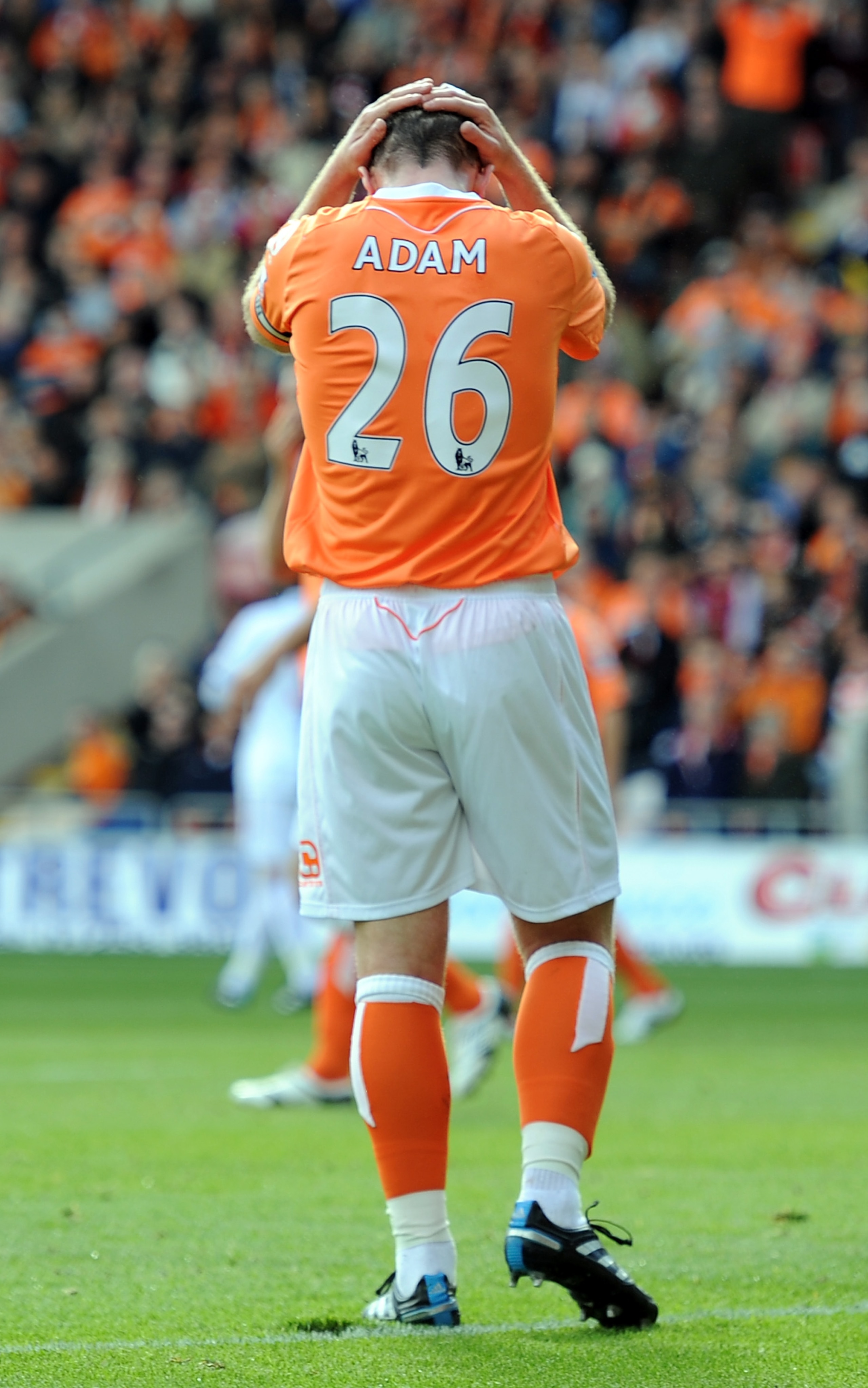 BLACKPOOL, ENGLAND - SEPTEMBER 25: Charlie Adam of Blackpool looks dejected after scoring an own goal during the Barclays Premiership match between Blackpool and Blackburn Rovers at Bloomfield Road on September 25, 2010 in Blackpool, England. (Photo by Ch