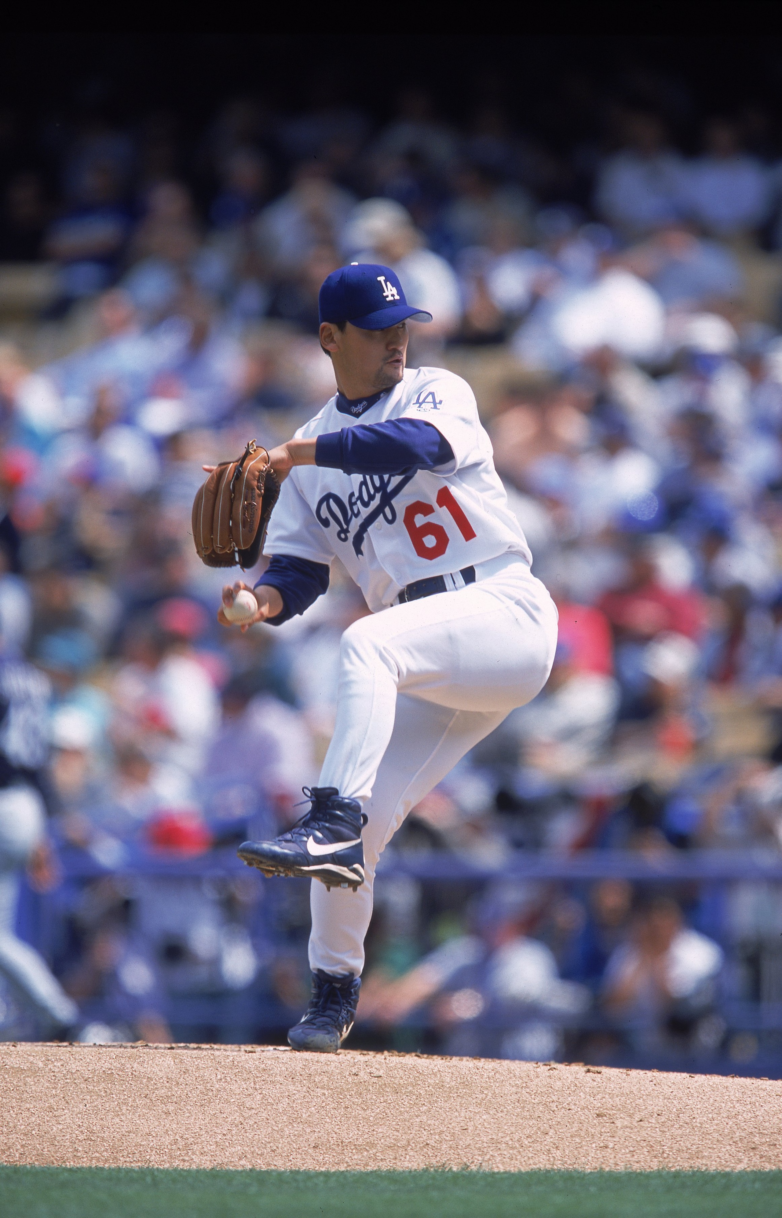 2 Apr 2001: Pitcher Chan Ho Park #61 of the Los Angeles Dodgers winds up for the pitch during the game against the Milwaukee Brewers at Dodger Stadium in Los Angeles, California. The Dodgers defeated the Brewers 1-0.Mandatory Credit: Jeff Gross /Allspo 2 Apr 2001: Pitcher Chan Ho Park #61 of the Los Angeles Dodgers winds up for the pitch during the game against the Milwaukee Brewers at Dodger Stadium in Los Angeles, California. The Dodgers defeated the Brewers 1-0.Mandatory Credit: Jeff Gross /Allspo