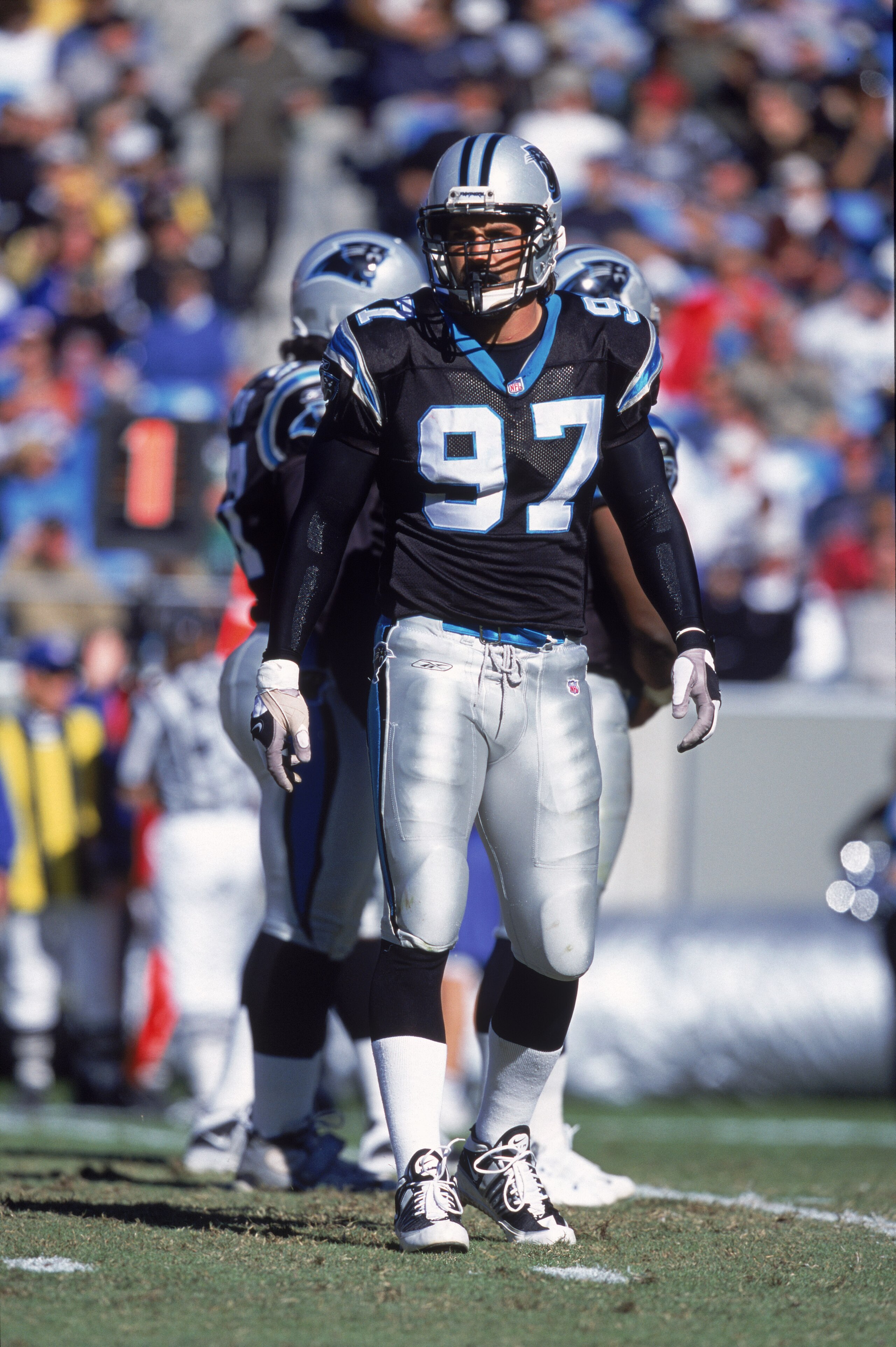28 Oct 2001: Defensive end Jason Peter #97 of the Carolina Panthers stands on the field during the NFL game against the New York Jets at Ericsson Stadium in Charlotte, North Carolina. The Jets edged the Panthers 13-12. Mandatory Credit: Craig Jones/All 28 Oct 2001: Defensive end Jason Peter #97 of the Carolina Panthers stands on the field during the NFL game against the New York Jets at Ericsson Stadium in Charlotte, North Carolina. The Jets edged the Panthers 13-12. Mandatory Credit: Craig Jones/All