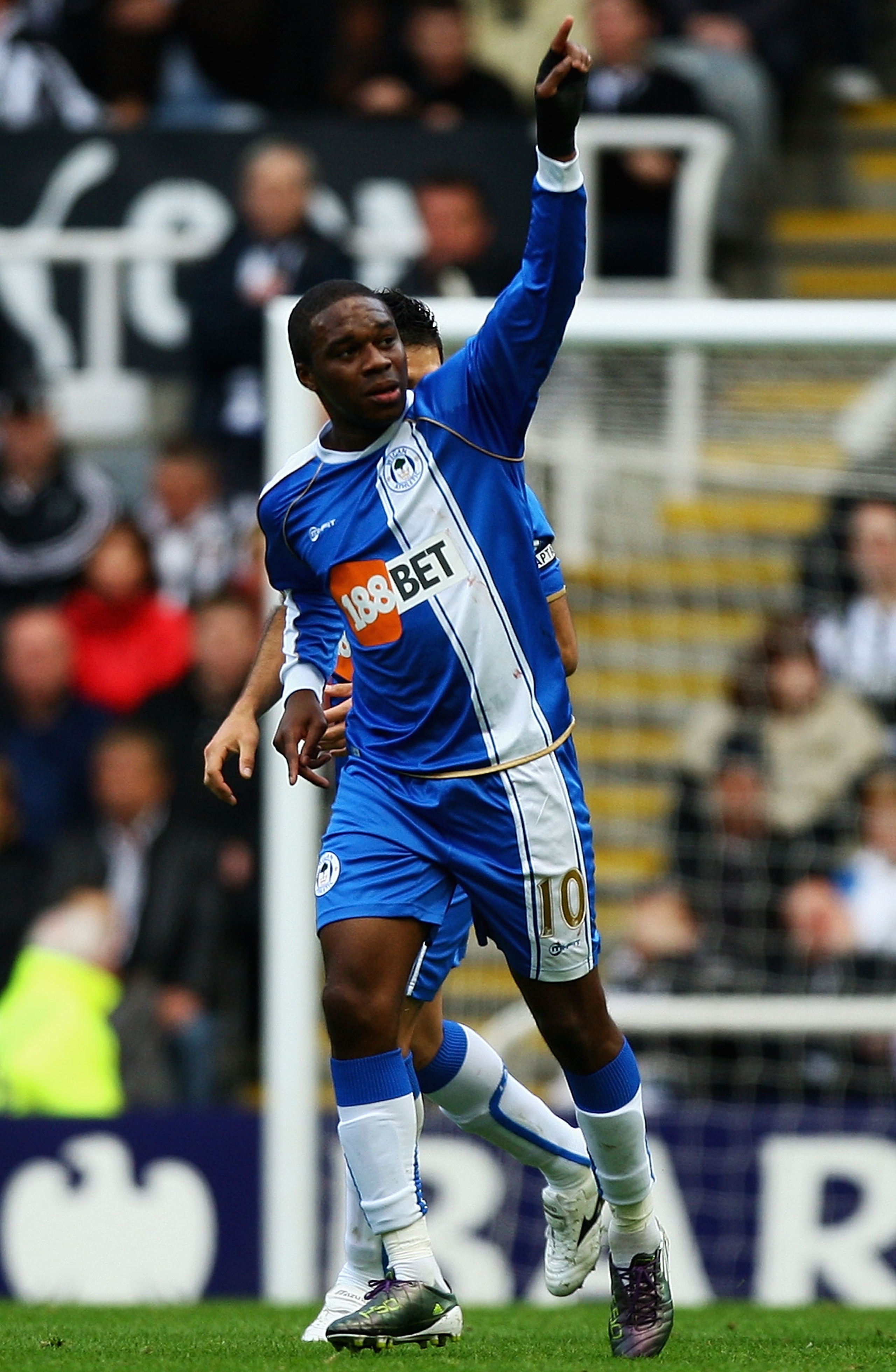 NEWCASTLE UPON TYNE, ENGLAND - OCTOBER 16:  Charles N'Zogbia of Wigan celebrates his second goal during the Barclays Premier League match between Newcastle United and Wigan Athletic at St James' Park on October 16, 2010 in Newcastle upon Tyne, England.  (