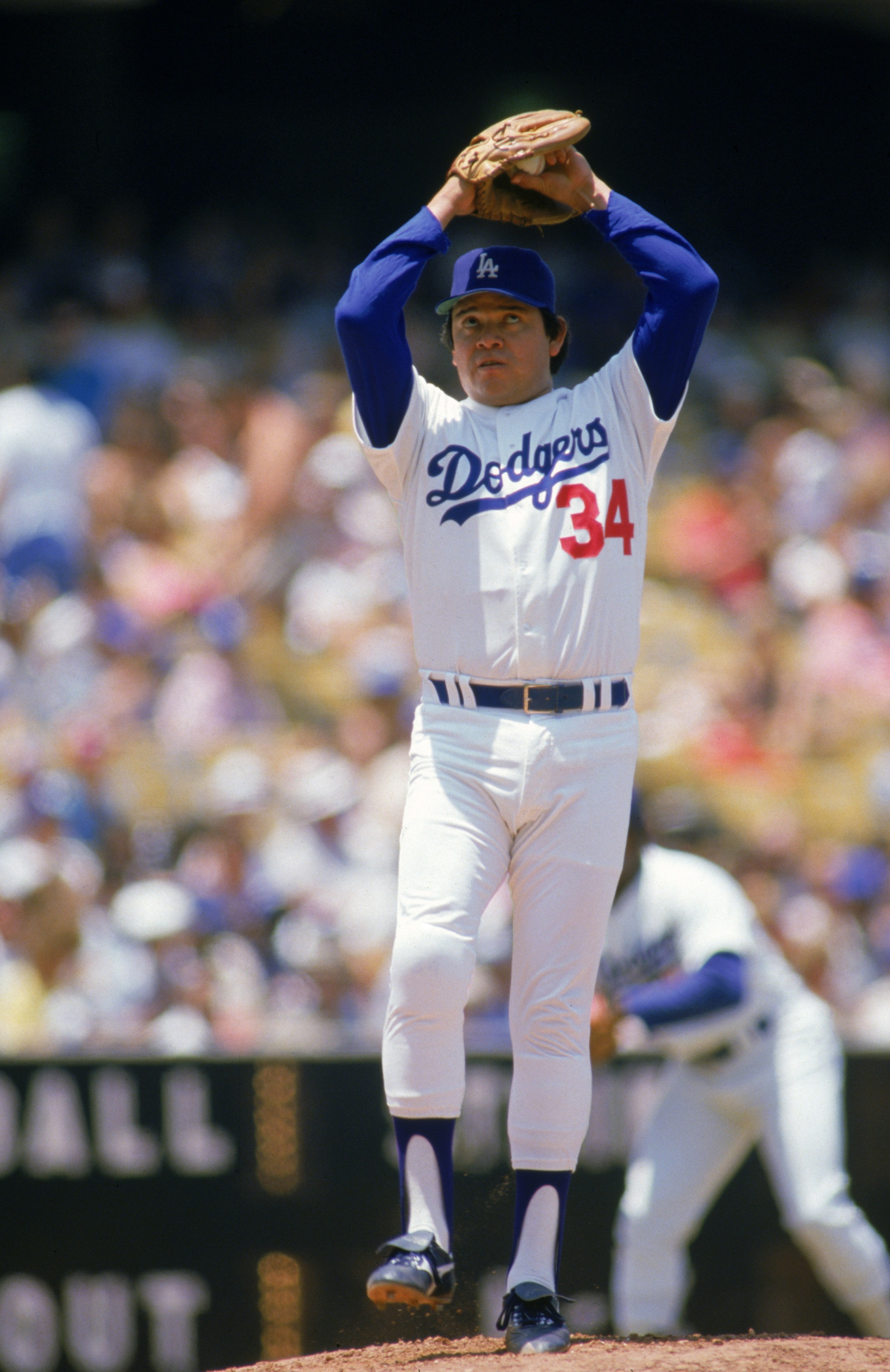 LOS ANGELES - June,1986: Pitcher Fernando Valenzuela #34 of the Los Angeles Dodgers winds up for a pitch during a June, 1986 MLB season game against the Houston Astros at Dodger Stadium in Los Angeles, California. (Photo by: Mike Powell/Getty Images) LOS ANGELES - June,1986: Pitcher Fernando Valenzuela #34 of the Los Angeles Dodgers winds up for a pitch during a June, 1986 MLB season game against the Houston Astros at Dodger Stadium in Los Angeles, California. (Photo by: Mike Powell/Getty Images)