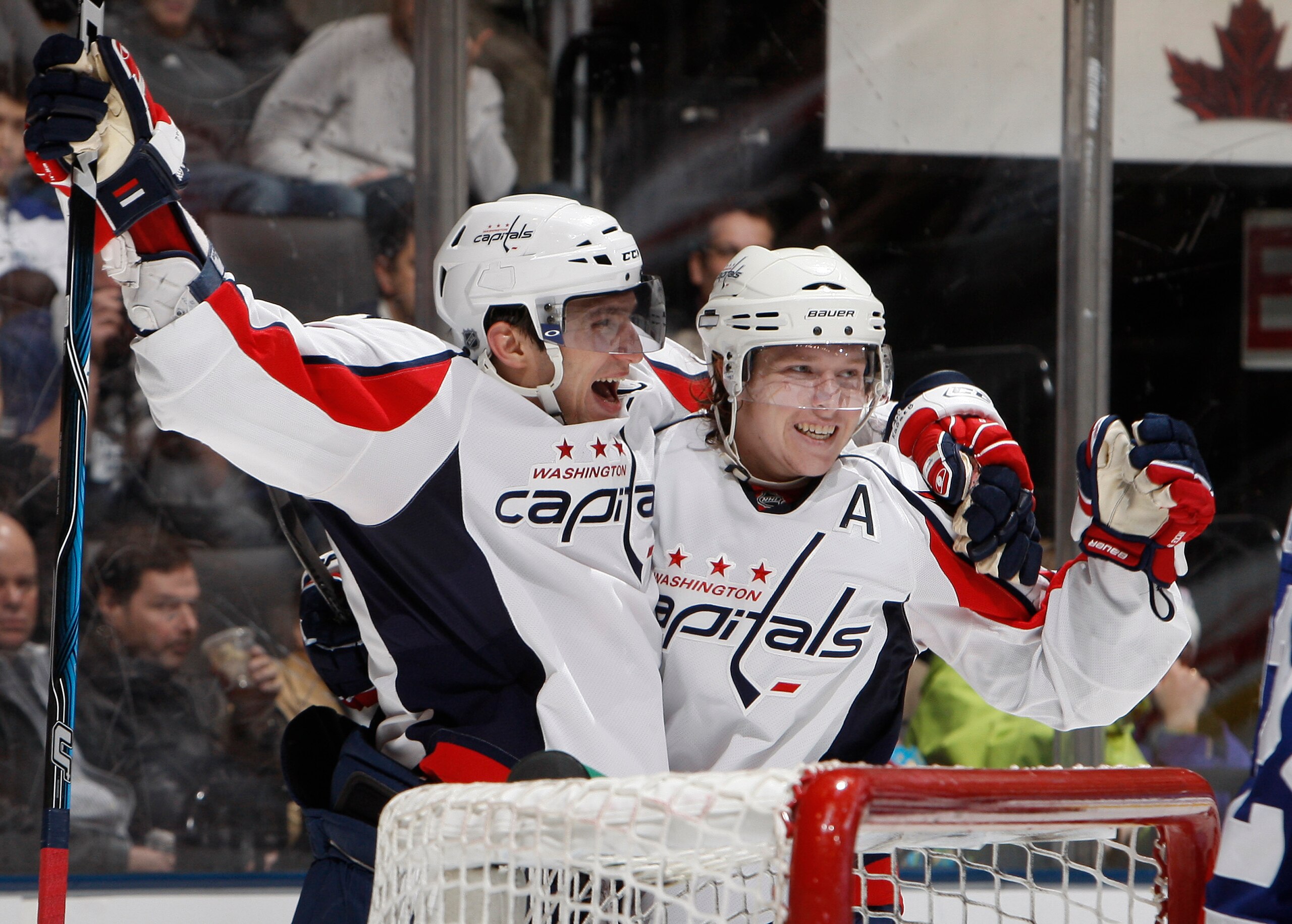 TORONTO, CANADA - JANUARY 22: Alex Ovechkin #8 and Nicklas Backstrom #19 of the Washington Capitals celebrates goal against the Toronto Maple Leafs during game action at the Air Canada Centre January 22, 2011 in Toronto, Ontario, Canada. (Photo by Abelima