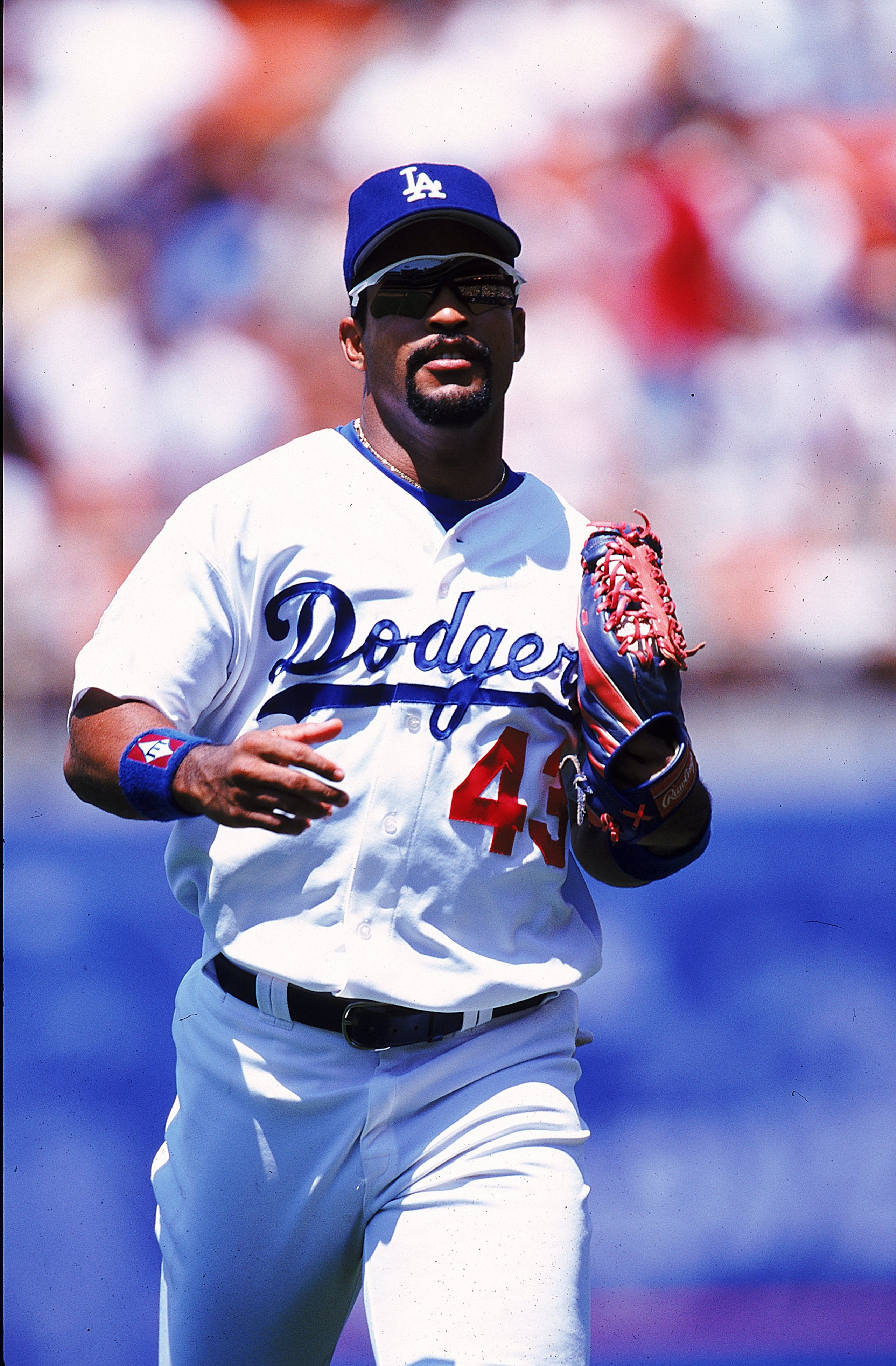 11 Jul 1999: Raul Mondesi #43 of the Los Angeles Dodgers runs on the field during a game against the Seattle Mariners at the Dodger Stadium in Los Angeles, California.. The Dodgers defeated the Mariners 14-3. 11 Jul 1999: Raul Mondesi #43 of the Los Angeles Dodgers runs on the field during a game against the Seattle Mariners at the Dodger Stadium in Los Angeles, California.. The Dodgers defeated the Mariners 14-3.