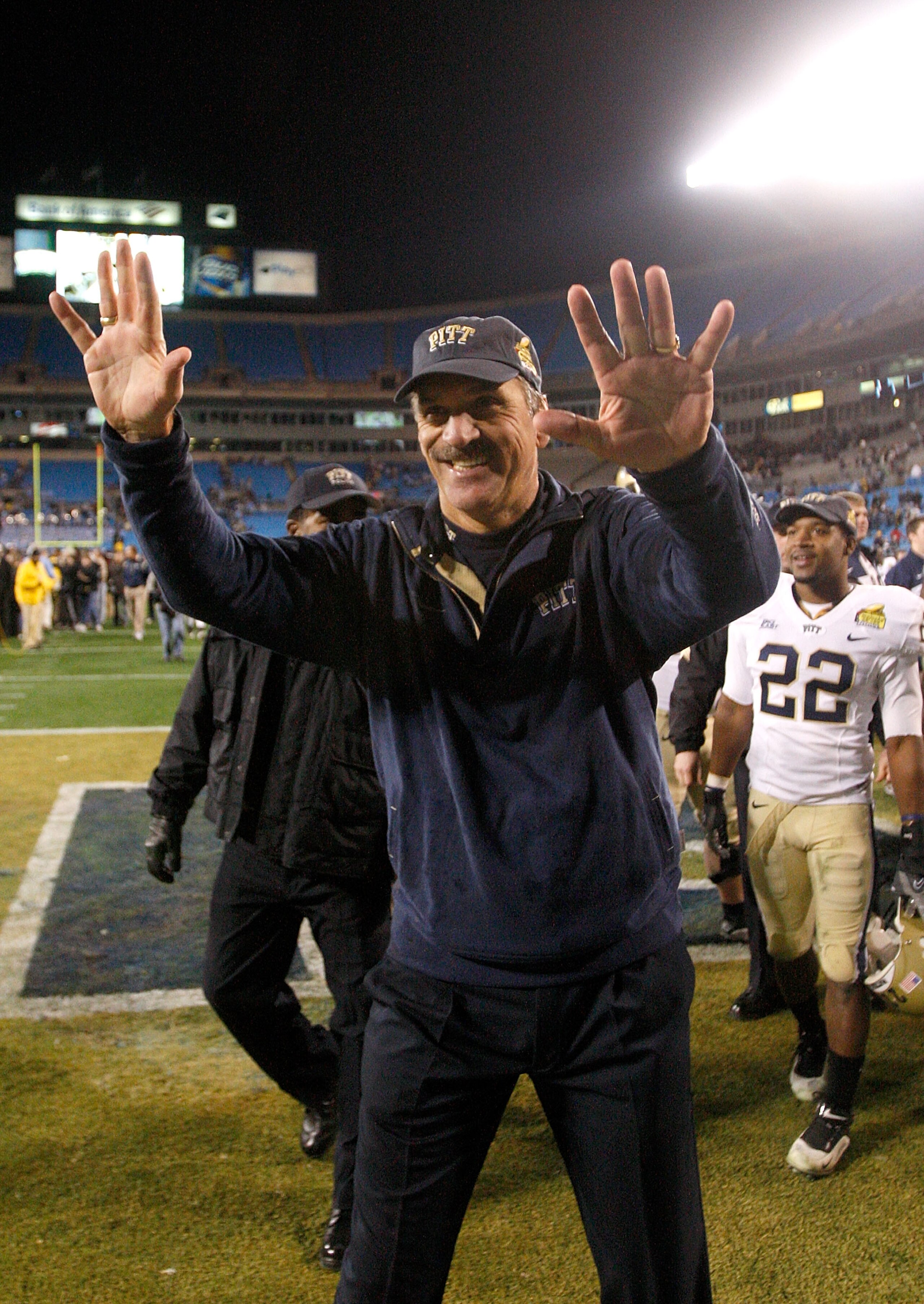 CHARLOTTE, NC - DECEMBER 26:  Head coach Dave Wannstedt of the Pittsburgh Panthers waves to the fans after a 19-17 victory over the North Carolina Tar Heels on December 26, 2009 in Charlotte, North Carolina.  (Photo by Streeter Lecka/Getty Images)
