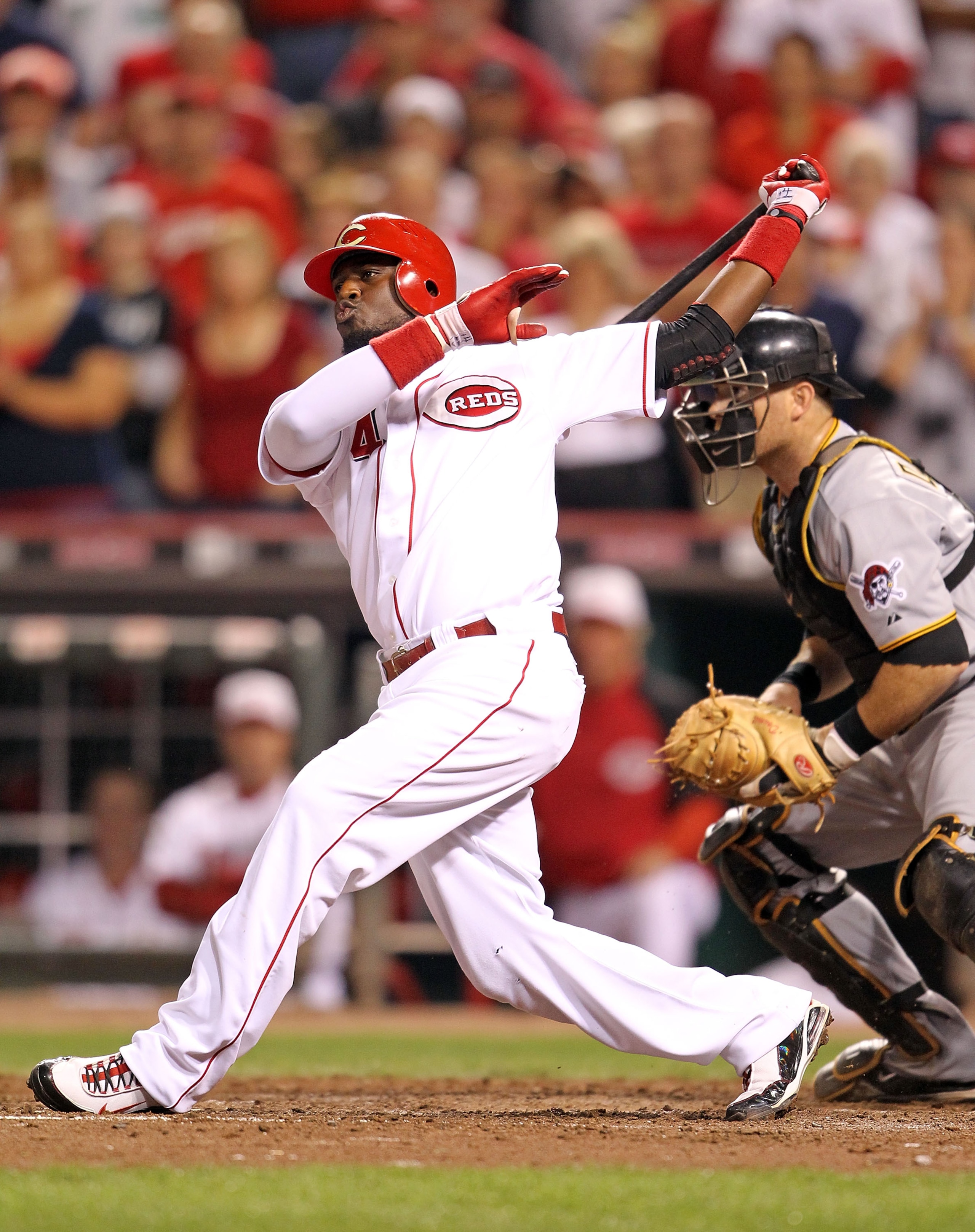 CINCINNATI - SEPTEMBER 11: Brandon Phillips #4 of the Cincinnati Reds swings at a pitch during the game against the Pittsburg Pirates at Great American Ball Park on September 11, 2010 in Cincinnati, Ohio.  (Photo by Andy Lyons/Getty Images)