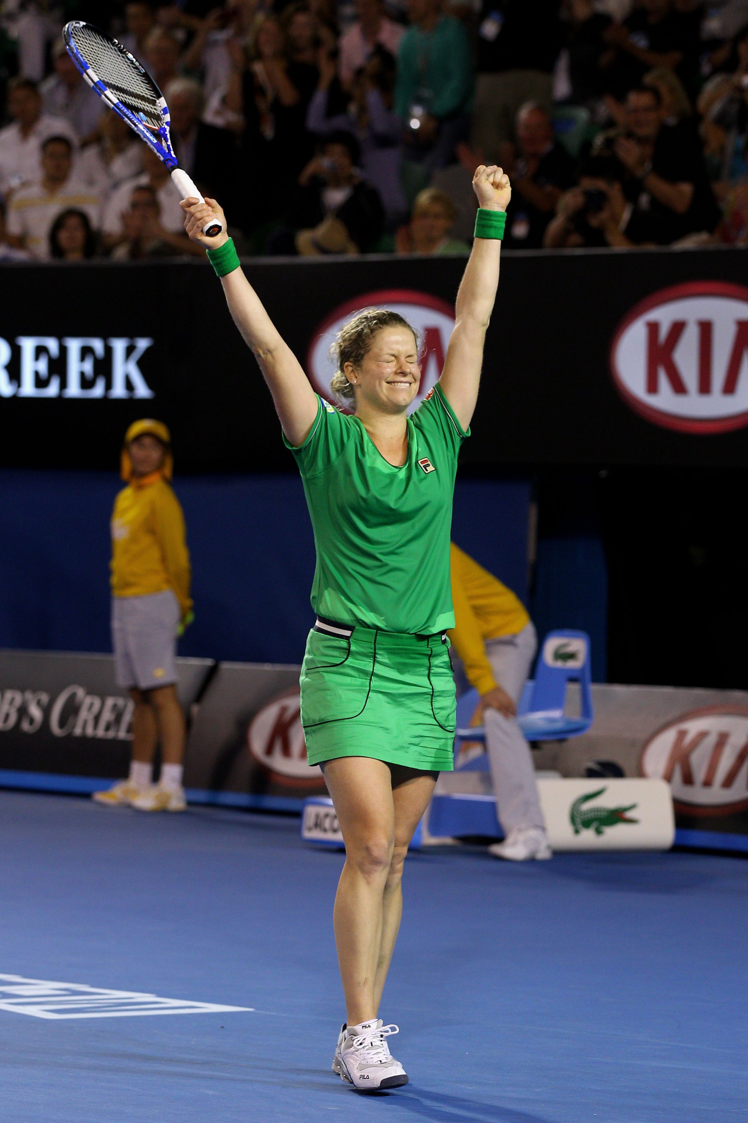 MELBOURNE, AUSTRALIA - JANUARY 29:  Kim Clijsters of Belgium celebrates championship point in her women's final match against Na Li of China during day thirteen of the 2011 Australian Open at Melbourne Park on January 29, 2011 in Melbourne, Australia.  (P