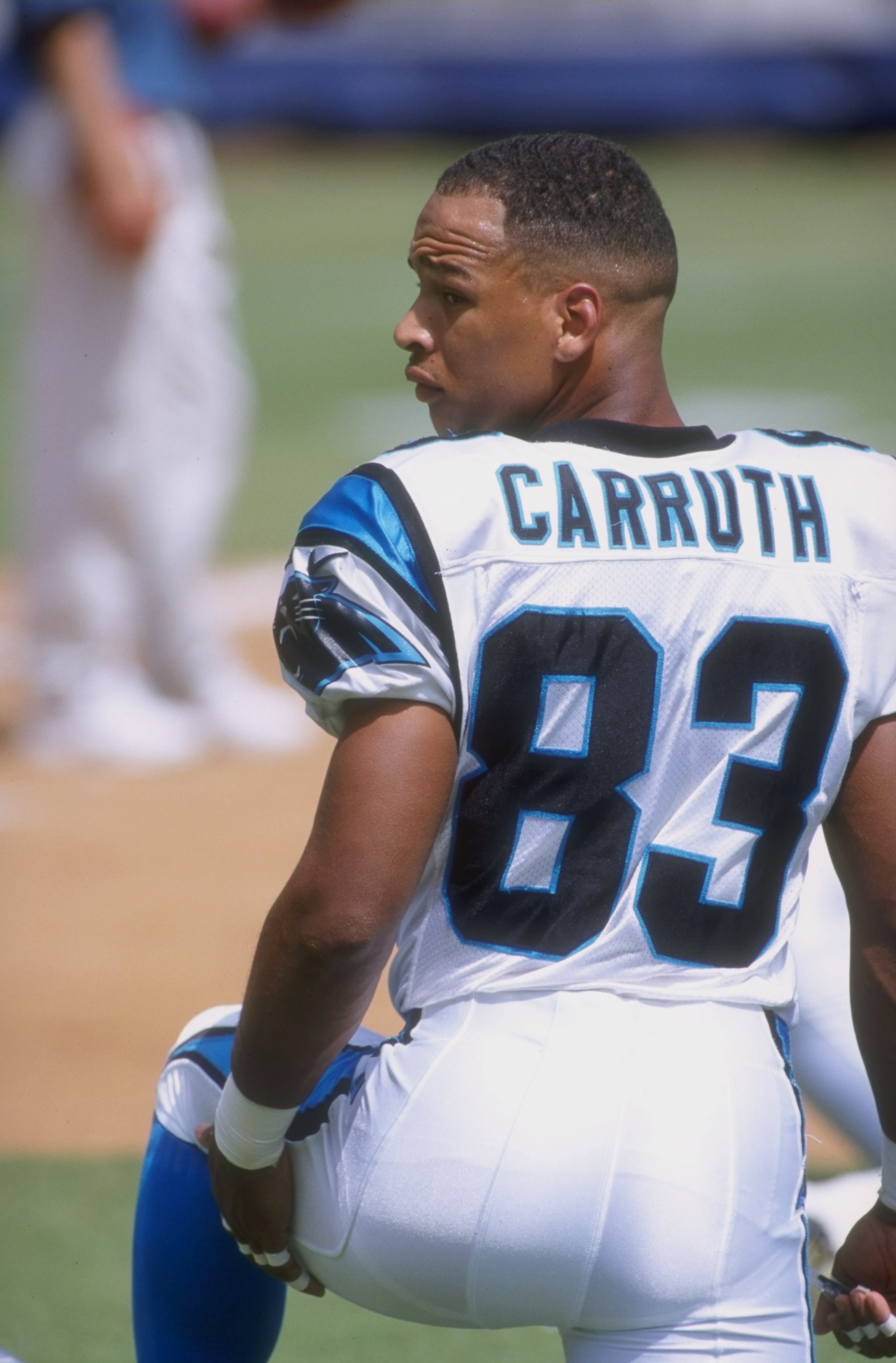 SAN DIEGO - SEPTEMBER 14: Rae Carruth #83 of the Carolina Panthers looks on from the sidelines during a game against the San Diego Chargers on September 14, 1997 at Qualcomm Stadium in San Diego, California. The Panthers defeated the Chargers 26-7. (Pho SAN DIEGO - SEPTEMBER 14: Rae Carruth #83 of the Carolina Panthers looks on from the sidelines during a game against the San Diego Chargers on September 14, 1997 at Qualcomm Stadium in San Diego, California. The Panthers defeated the Chargers 26-7. (Pho