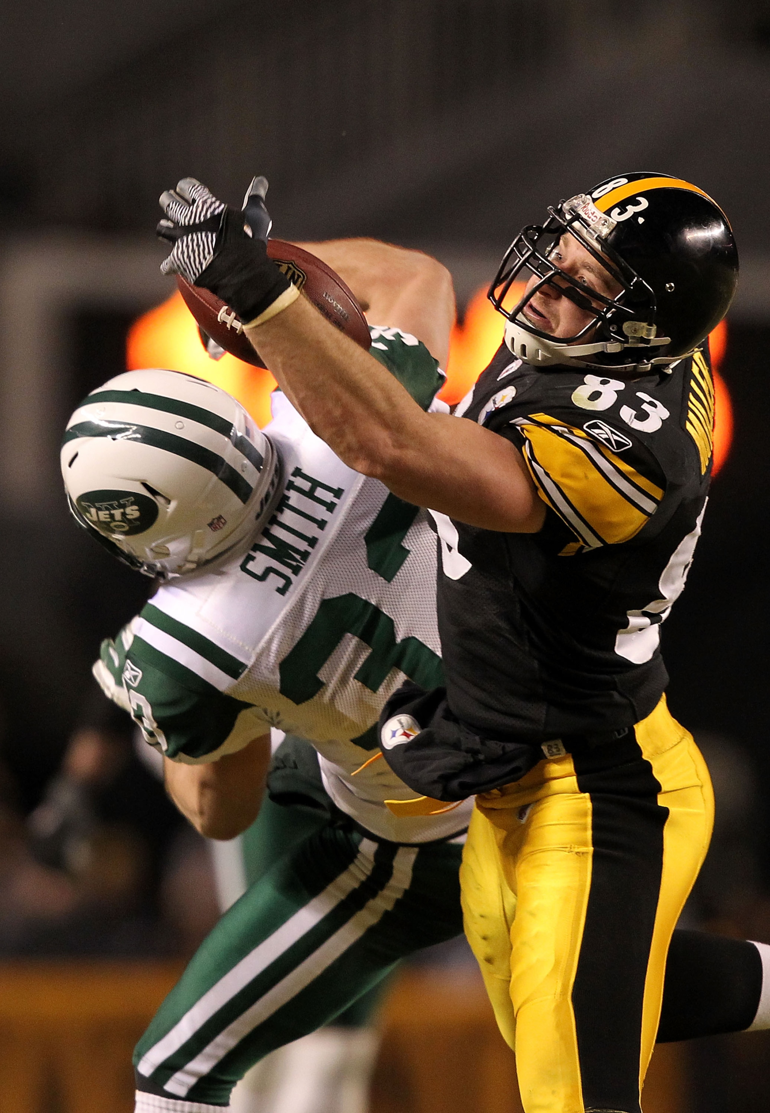 PITTSBURGH, PA - JANUARY 23:  Eric Smith #33 of the New York Jets breaks up a pass intended for Heath Miller #83 of the Pittsburgh Steelers during the 2011 AFC Championship game at Heinz Field on January 23, 2011 in Pittsburgh, Pennsylvania. The Steelers