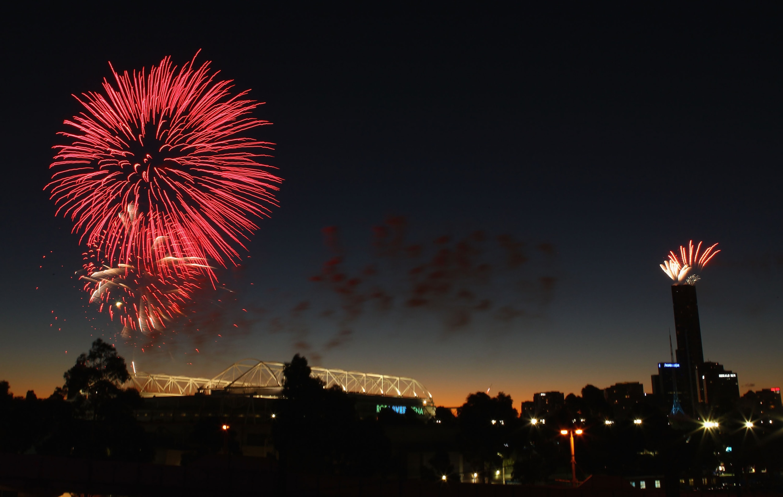 MELBOURNE, AUSTRALIA - JANUARY 26:  Fireworks celebrating Australia Day light up the sky during day ten of the 2011 Australian Open at Melbourne Park on January 26, 2011 in Melbourne, Australia.  (Photo by Clive Brunskill/Getty Images)