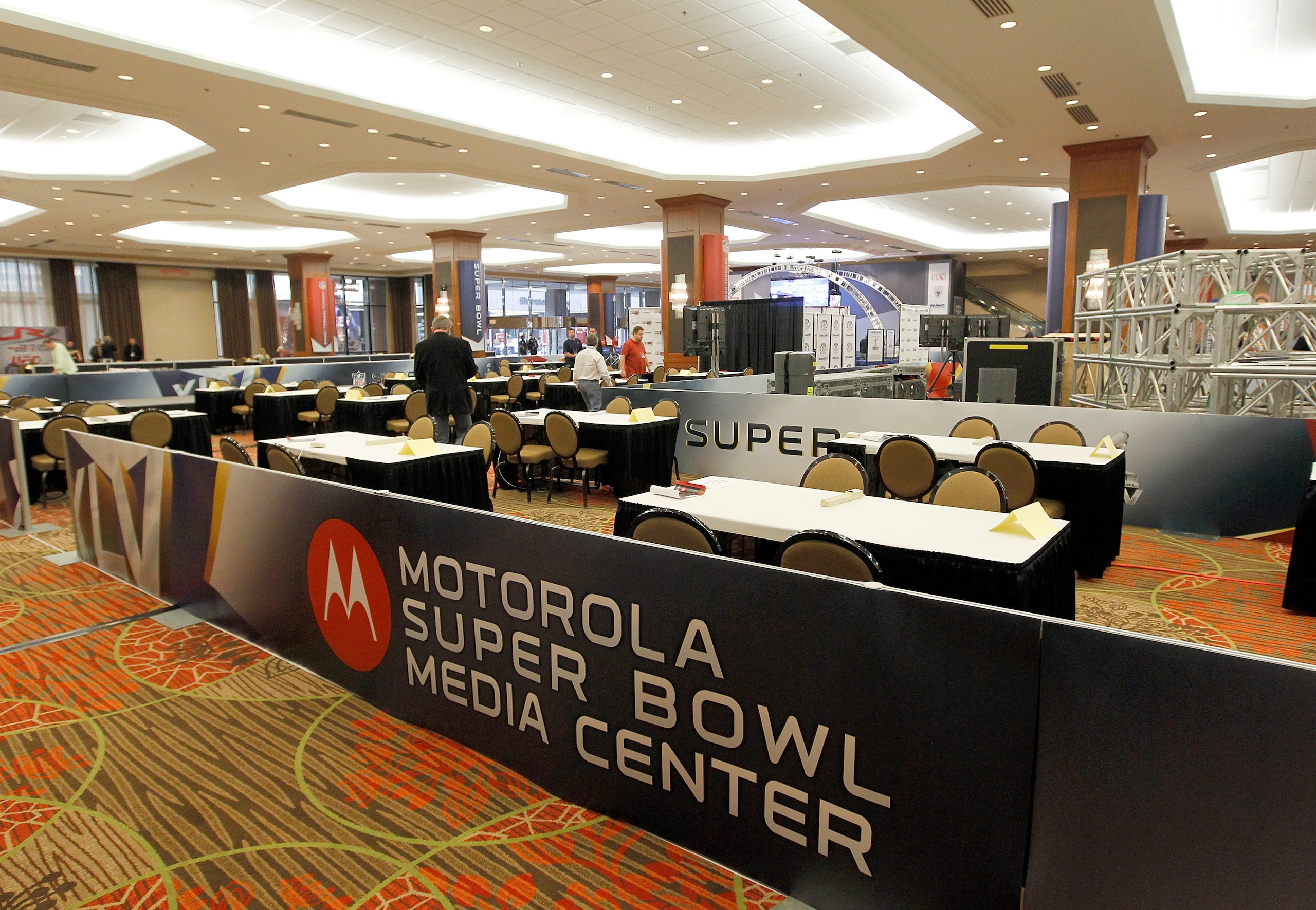 DALLAS, TX - JANUARY 30: Members of the working media arrive for the opening day of the Motorola Super Bowl XLV Media Center on January 30, 2011 in Dallas, Texas. Cowboys Stadium will host Super Bowl XLV on February 6, 2011 between the Pittsburgh Steele DALLAS, TX - JANUARY 30: Members of the working media arrive for the opening day of the Motorola Super Bowl XLV Media Center on January 30, 2011 in Dallas, Texas. Cowboys Stadium will host Super Bowl XLV on February 6, 2011 between the Pittsburgh Steele