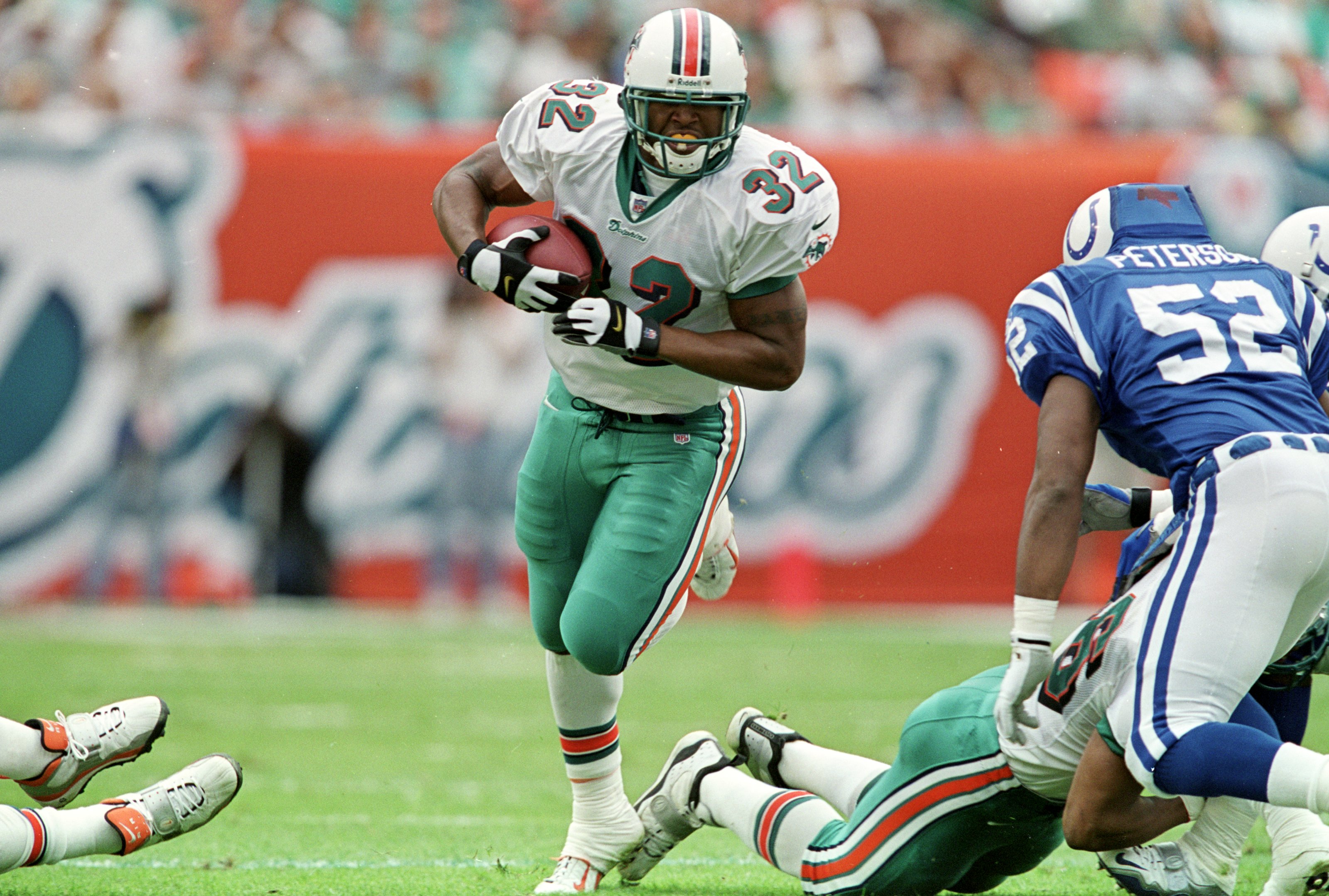 Mark Higgs of the Miami Dolphins carries the ball during a game News  Photo - Getty Images