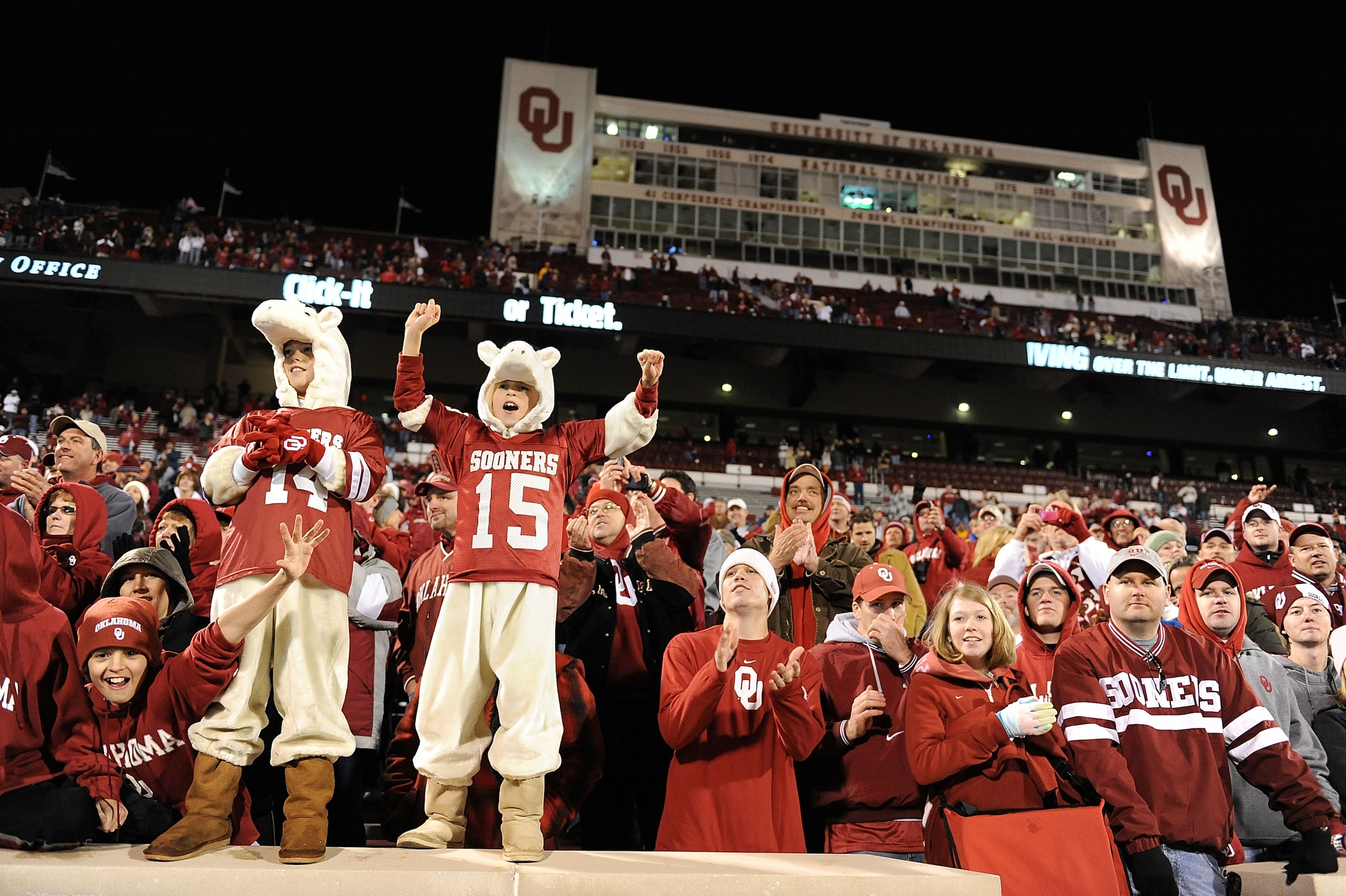 NORMAN, OK - NOVEMBER 22:  Fans of the Oklahoma Sooners celebrate a 65-21 win against the Texas Tech Red Raiders at Memorial Stadium on November 22, 2008 in Norman, Oklahoma.  (Photo by Ronald Martinez/Getty Images)