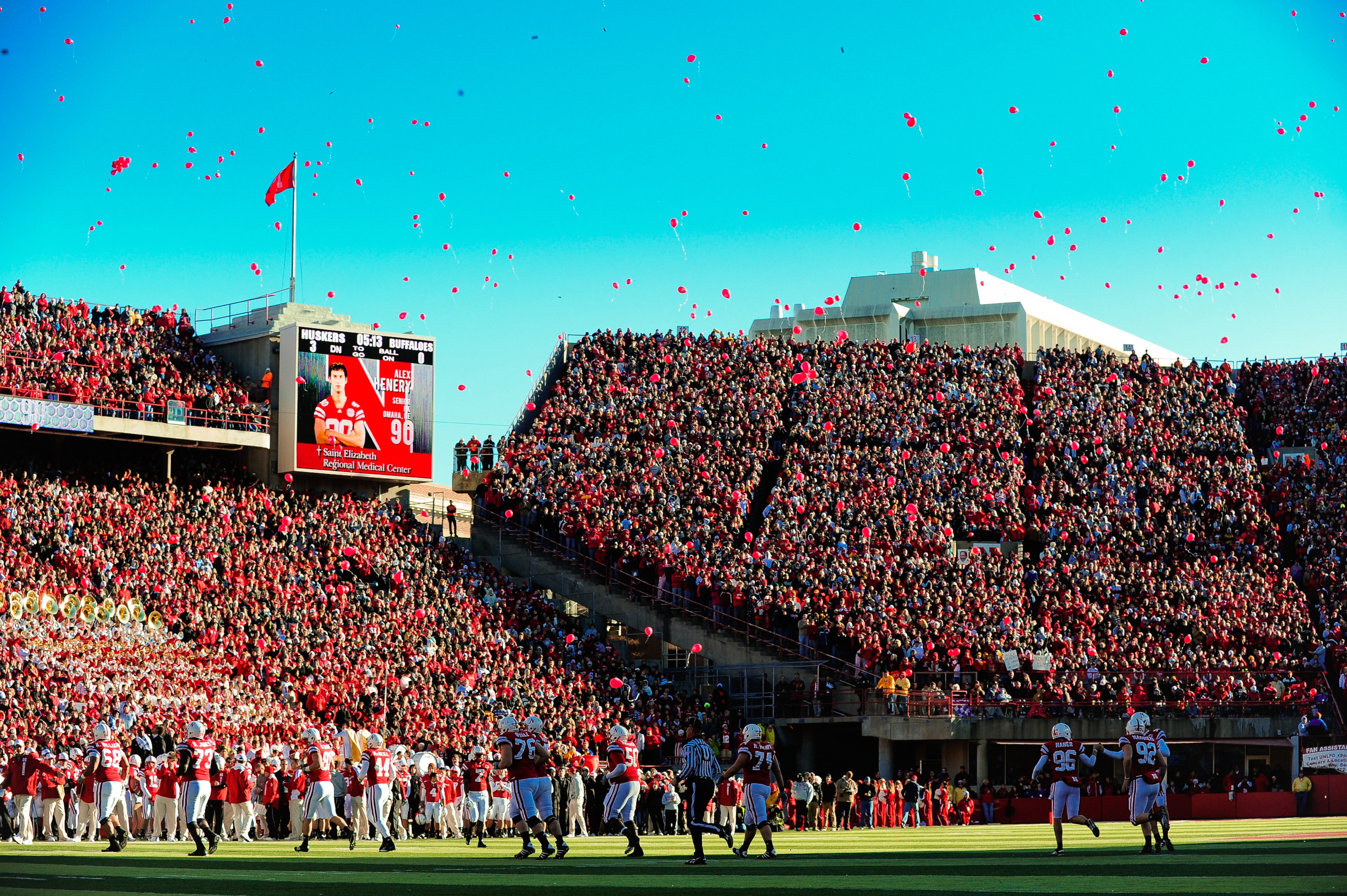 LINCOLN, NE - NOVEMBER 26: A release of balloons into the November sky celebrates Nebrask'a first touchdown of the game against the Colorado Buffaloes during their game at Memorial Stadium on November 26, 2010 in Lincoln, Nebraska. Nebraska defeated Color LINCOLN, NE - NOVEMBER 26: A release of balloons into the November sky celebrates Nebrask'a first touchdown of the game against the Colorado Buffaloes during their game at Memorial Stadium on November 26, 2010 in Lincoln, Nebraska. Nebraska defeated Color