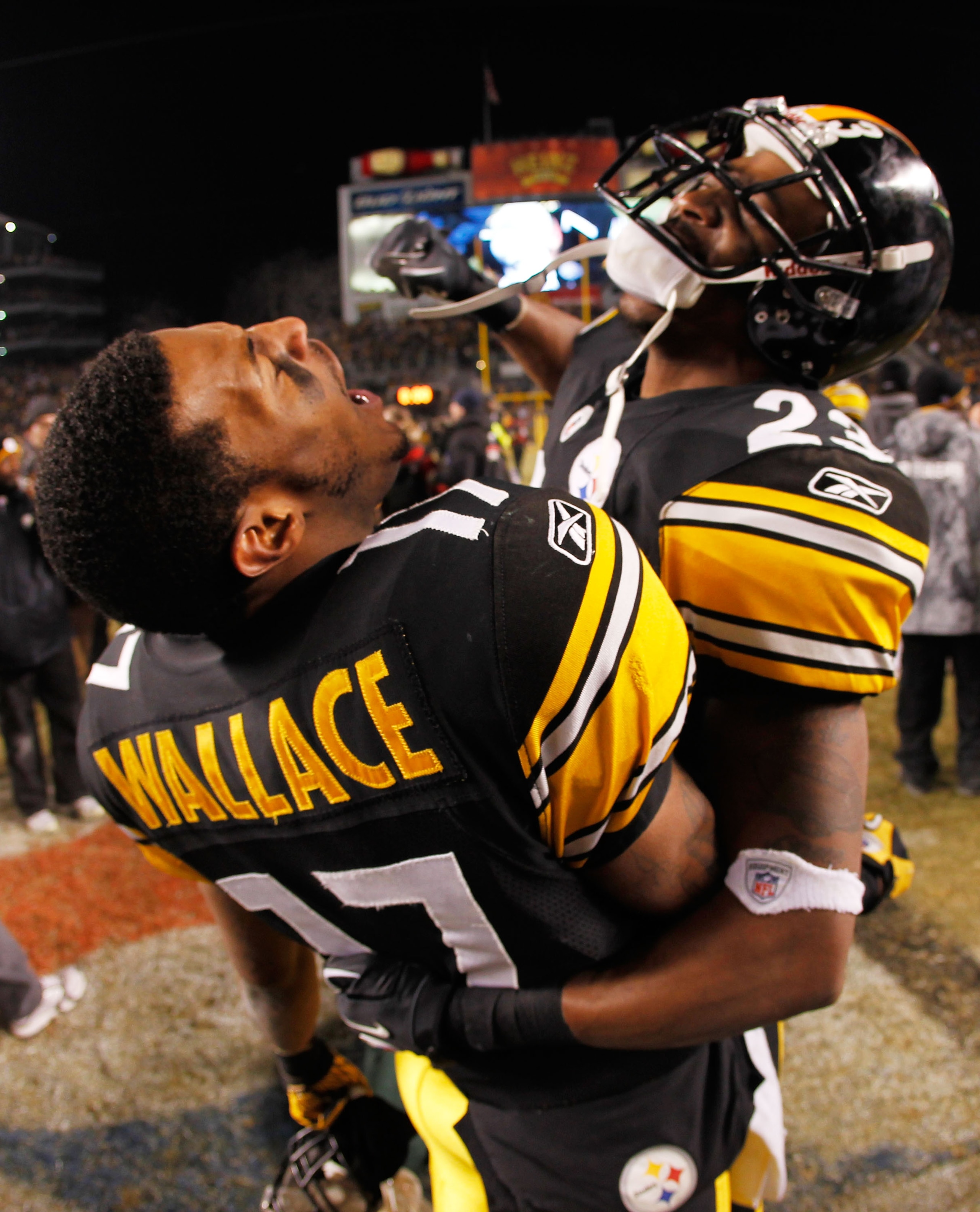 PITTSBURGH, PA - JANUARY 23:  Mike Wallace #17 and Keenan Lewis #23 of the Pittsburgh Steelers celebrate their 24 to 19 win over the New York Jets in the 2011 AFC Championship game at Heinz Field on January 23, 2011 in Pittsburgh, Pennsylvania.  (Photo by