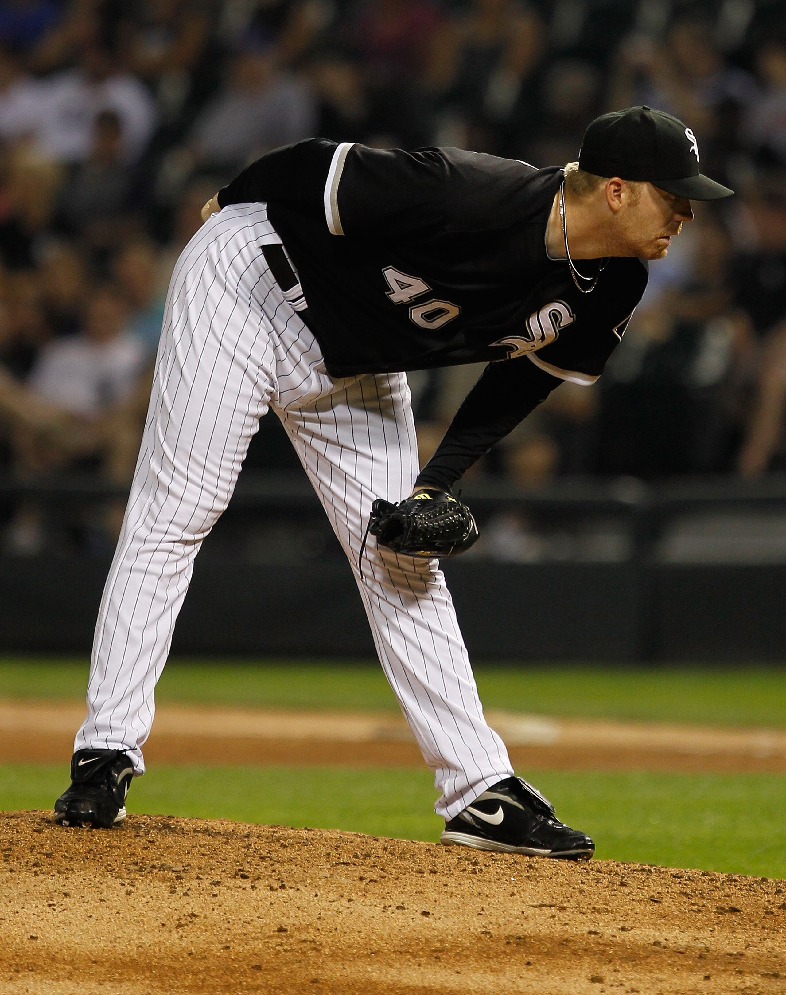 CHICAGO - JULY 07: J.J. Putz #40 of the Chicago White Sox looks for the catchers' signs before pitching against the Los Angeles Angels of Anaheim at U.S. Cellular Field on July 7, 2010 in Chicago, Illinois. The White Sox defeated the Angels 5-2. (Photo b CHICAGO - JULY 07: J.J. Putz #40 of the Chicago White Sox looks for the catchers' signs before pitching against the Los Angeles Angels of Anaheim at U.S. Cellular Field on July 7, 2010 in Chicago, Illinois. The White Sox defeated the Angels 5-2. (Photo b