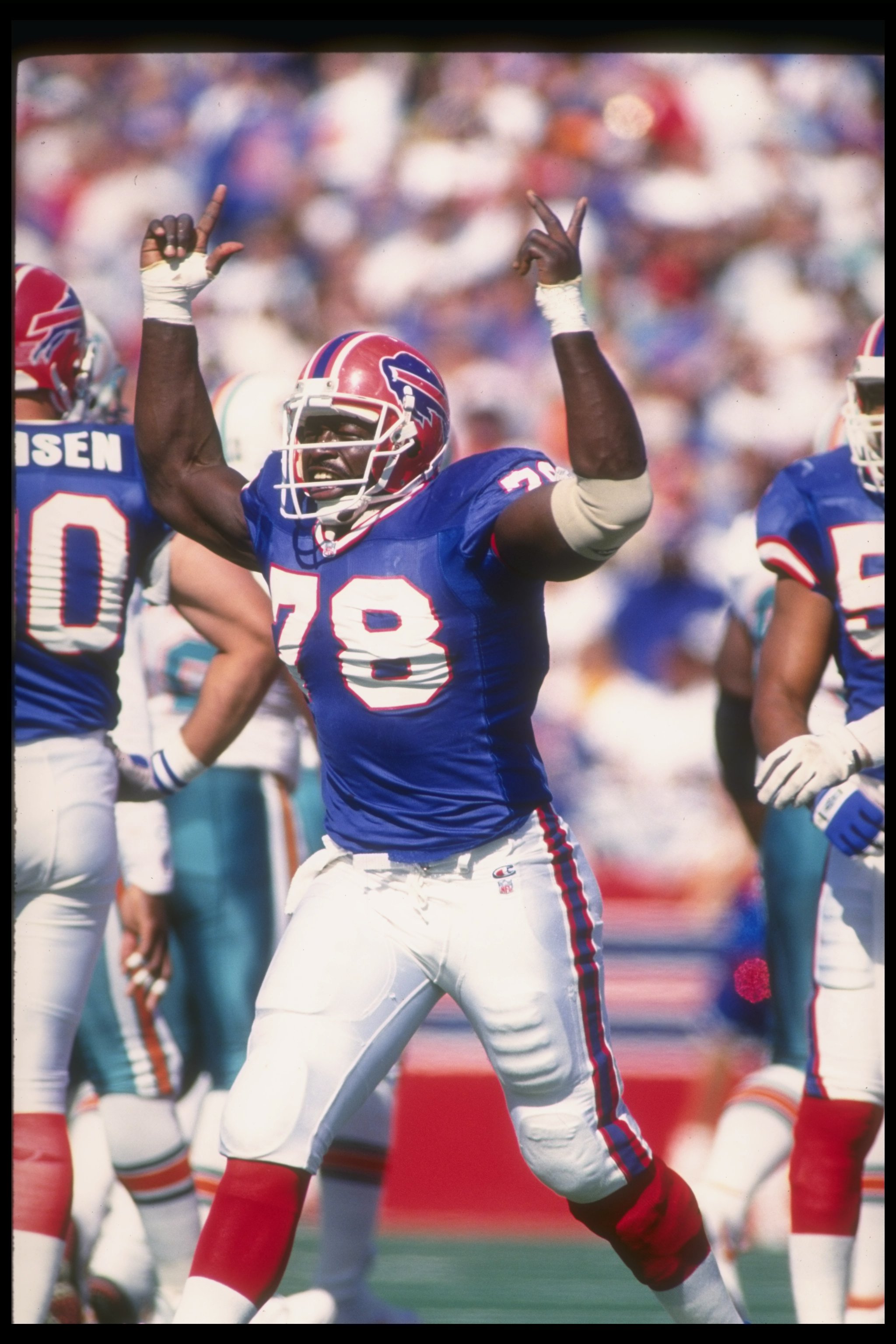 4 Oct 1992: Defensive lineman Bruce Smith of the Buffalo Bills celebrates during a game against the Miami Dolphins at Rich Stadium in Orchard Park, New York. The Dolphins won the game, 37-10.