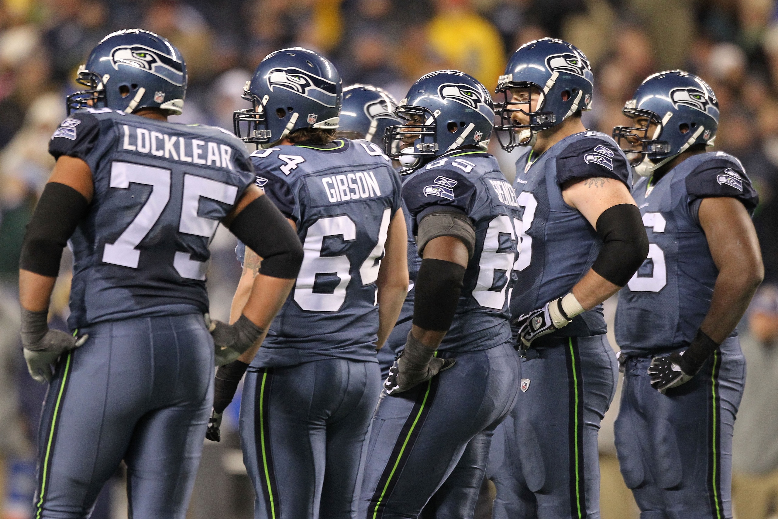 SEATTLE, WA - JANUARY 02: Members of the Seattle Seahawks offensive line stand on the field during the game against the St. Louis Ramsat Qwest Field on January 2, 2011 in Seattle, Washington. (Photo by Otto Greule Jr/Getty Images) SEATTLE, WA - JANUARY 02: Members of the Seattle Seahawks offensive line stand on the field during the game against the St. Louis Ramsat Qwest Field on January 2, 2011 in Seattle, Washington. (Photo by Otto Greule Jr/Getty Images)