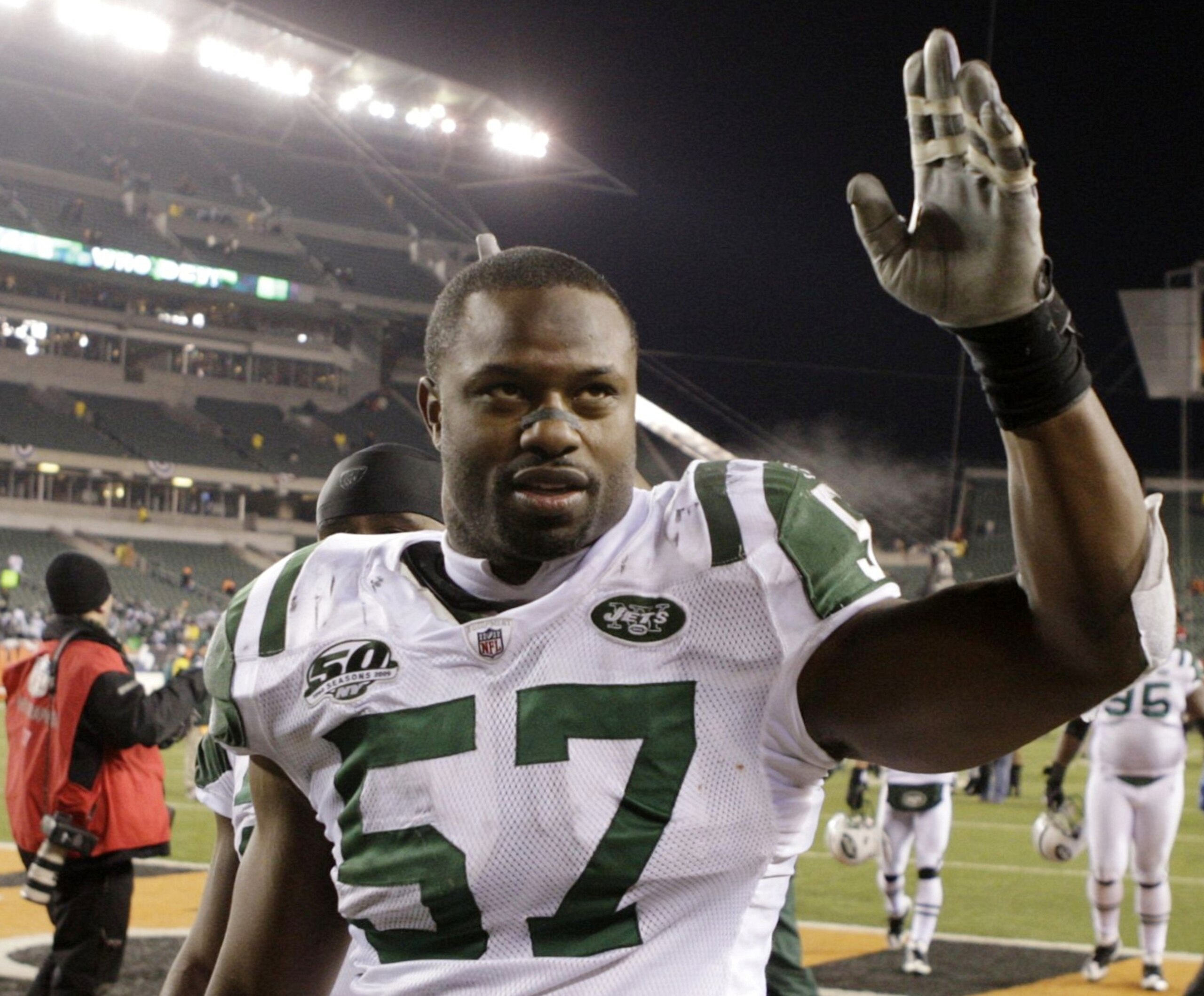 CINCINNATI - JANUARY 9: Linebacker Bart Scott #57 of the New York Jets walks off the field after defeating the Cincinnati Bengals in the 2010 AFC wild-card playoff game at Paul Brown Stadium on January 9, 2010 in Cincinnati, Ohio. (Photo by Andy Lyons/Ge CINCINNATI - JANUARY 9: Linebacker Bart Scott #57 of the New York Jets walks off the field after defeating the Cincinnati Bengals in the 2010 AFC wild-card playoff game at Paul Brown Stadium on January 9, 2010 in Cincinnati, Ohio. (Photo by Andy Lyons/Ge