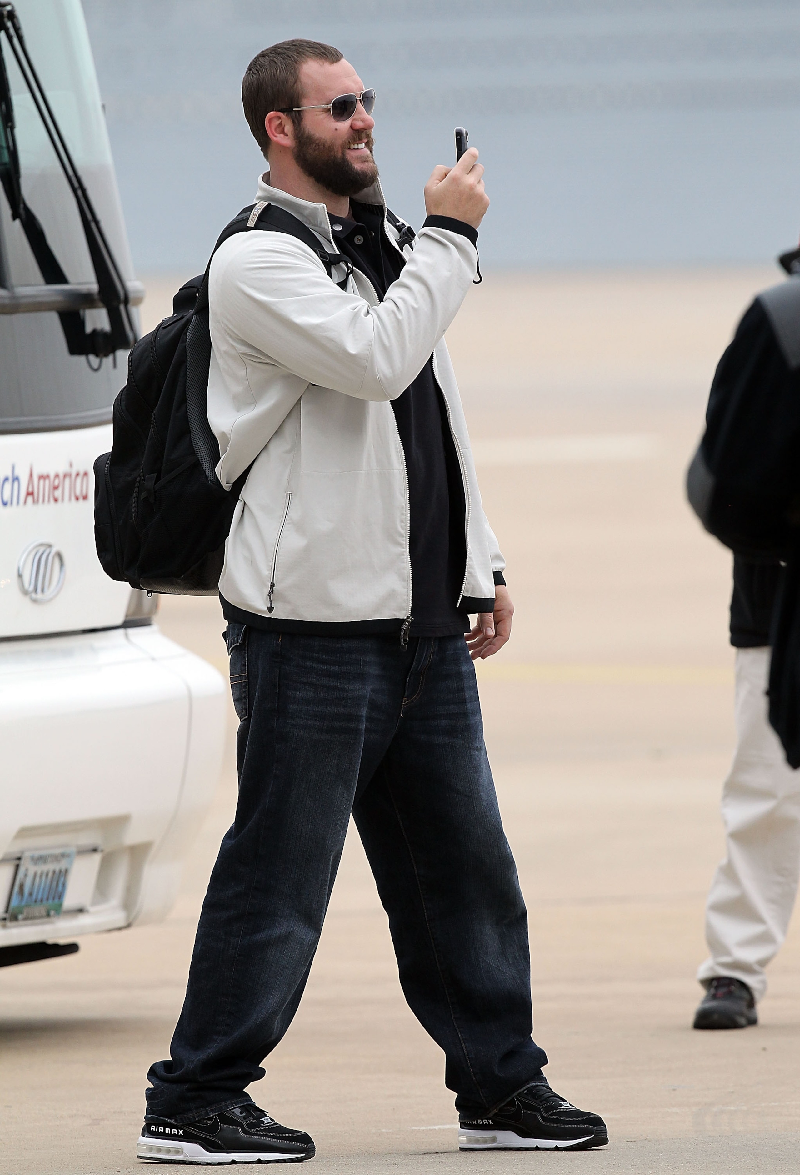 DALLAS, TX - JANUARY 31: Quarterback Ben Roethlisberger #7 of the Pittsburgh Steelers records a video while arriving at Dallas Fort Worth International Airport on January 31, 2011 in Dallas, Texas. The Pittsburgh Steelers will play the Green Bay Packers DALLAS, TX - JANUARY 31: Quarterback Ben Roethlisberger #7 of the Pittsburgh Steelers records a video while arriving at Dallas Fort Worth International Airport on January 31, 2011 in Dallas, Texas. The Pittsburgh Steelers will play the Green Bay Packers