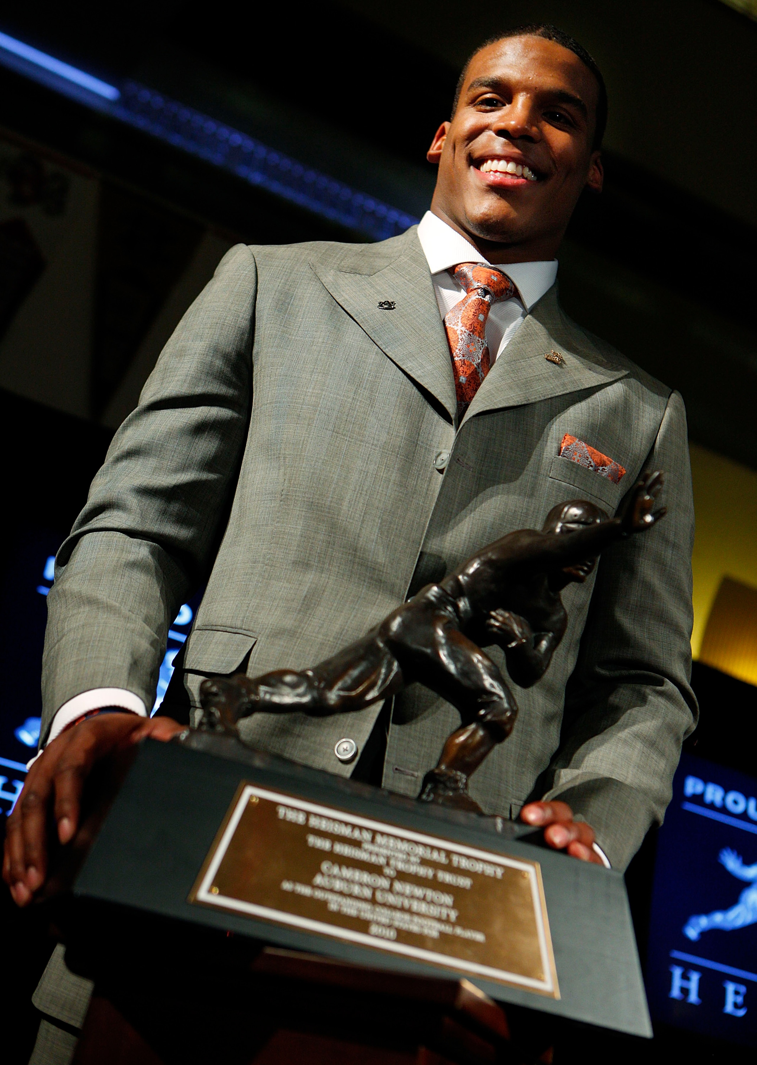 NEW YORK - DECEMBER 11: Cam Newton, quarterback of the Auburn University Tigers, speaks after being awarded the 2010 Heisman Memorial Trophy Award on December 11, 2010 in New York City. (Photo by Jeff Zelevansky/Getty Images) NEW YORK - DECEMBER 11: Cam Newton, quarterback of the Auburn University Tigers, speaks after being awarded the 2010 Heisman Memorial Trophy Award on December 11, 2010 in New York City. (Photo by Jeff Zelevansky/Getty Images)