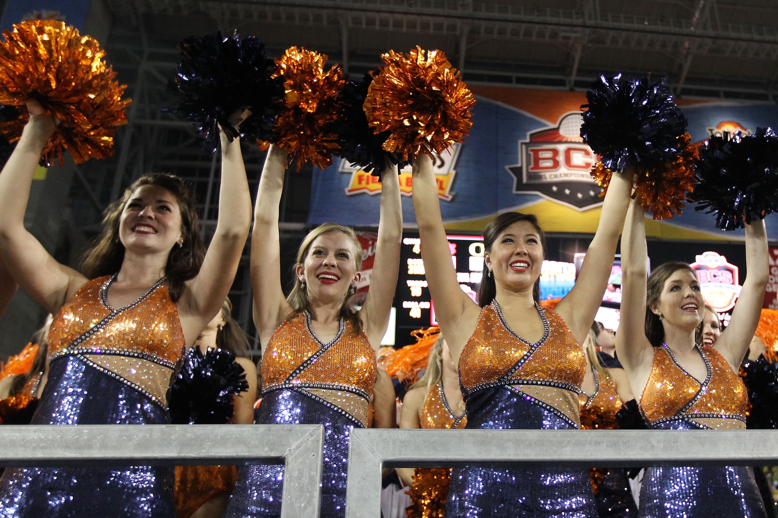 GLENDALE, AZ - JANUARY 10:  Auburn Tigers cheerleaders perform during the Tostitos BCS National Championship Game against the Oregon Ducks at University of Phoenix Stadium on January 10, 2011 in Glendale, Arizona.  (Photo by Christian Petersen/Getty Image