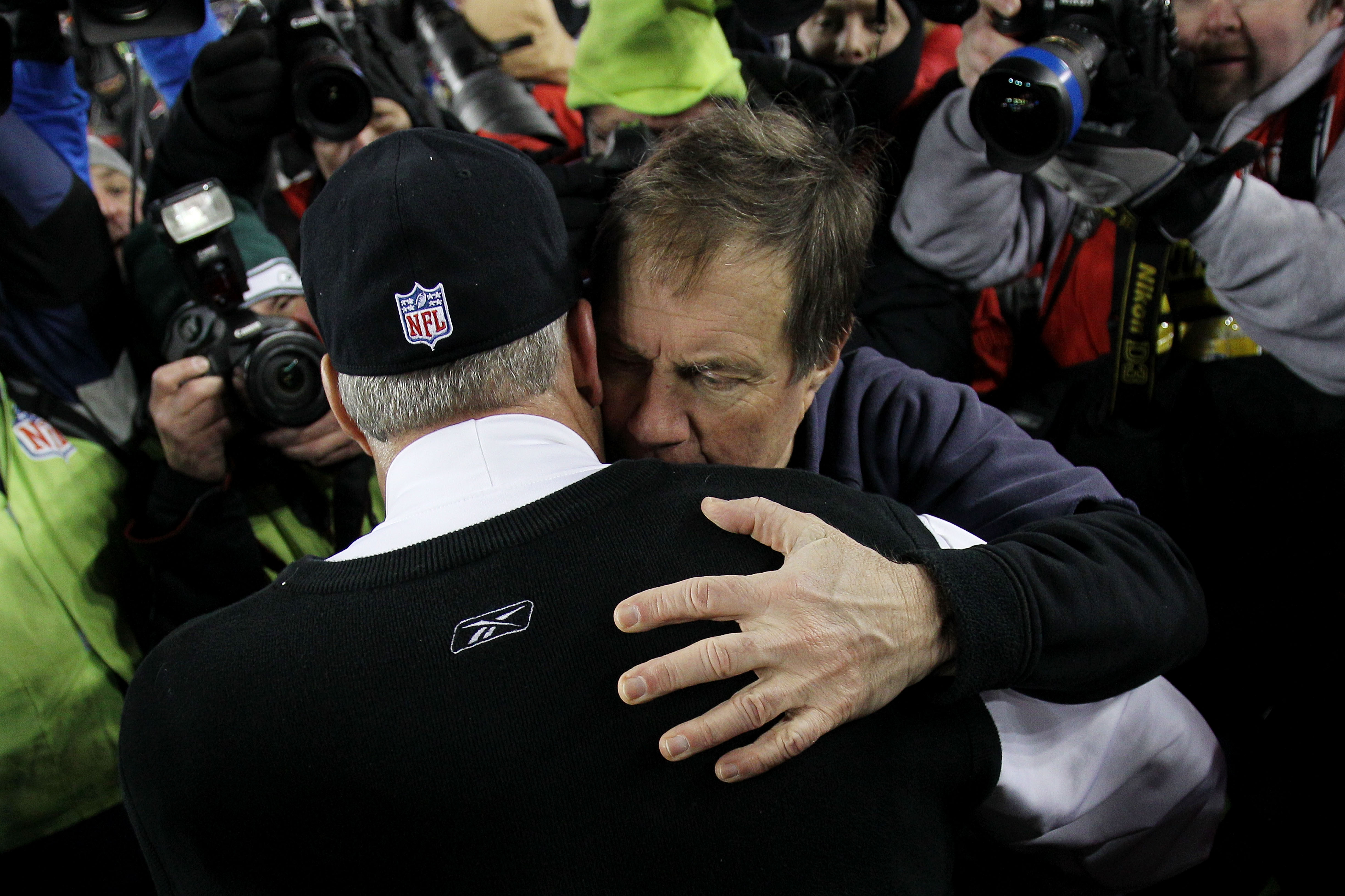 FOXBORO, MA - JANUARY 16: Head coach Bill Belichick of the New England Patriots hugs head coach Rex Ryan of the New York Jets following their 2011 AFC divisional playoff game at Gillette Stadium on January 16, 2011 in Foxboro, Massachusetts. (Photo by E