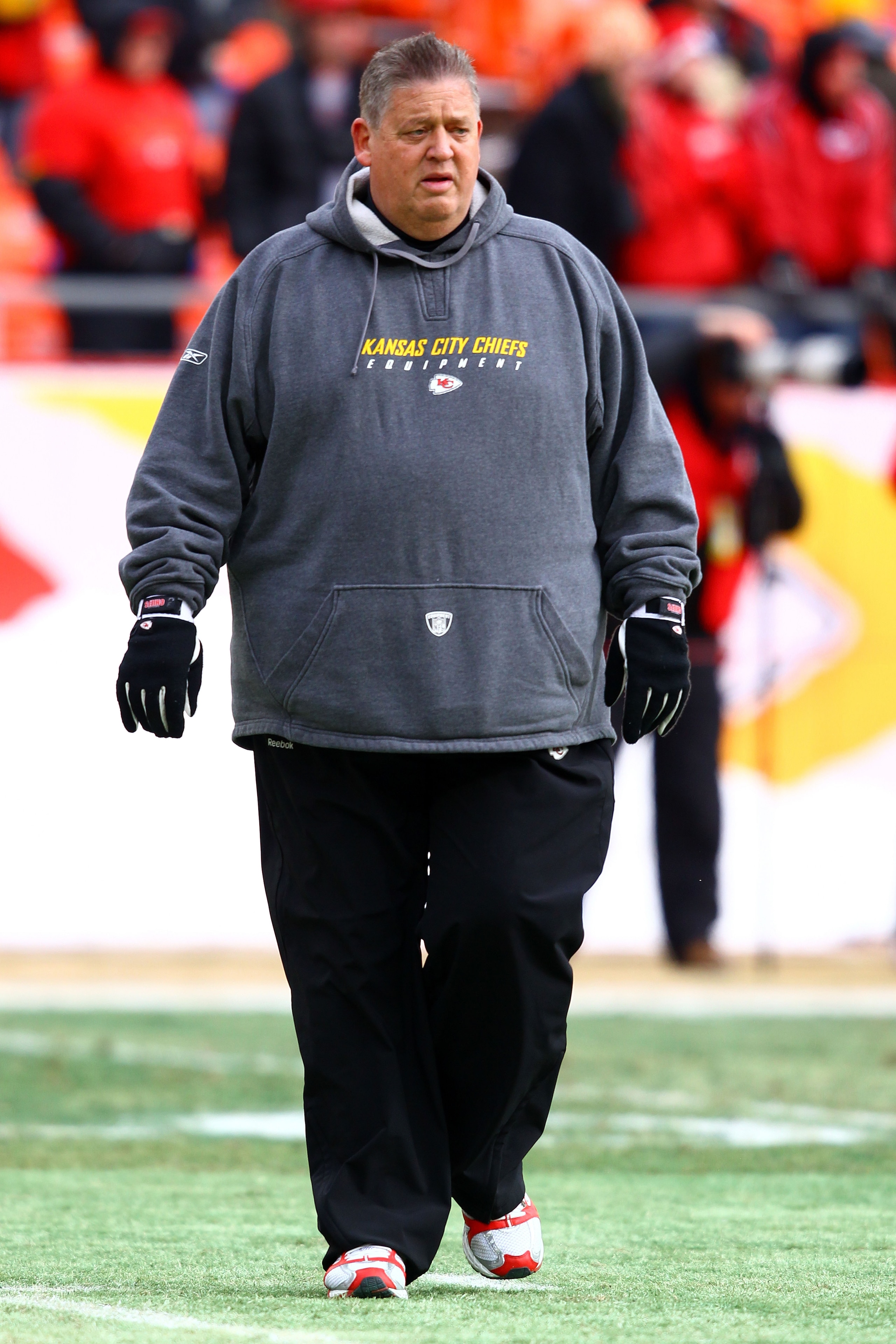KANSAS CITY, MO - JANUARY 09: Offensive coordinator Charlie Weis of the Kansas City Chiefs walks in the field prior to playing the Baltimore Ravens in their 2011 AFC wild card playoff game at Arrowhead Stadium on January 9, 2011 in Kansas City, Missouri. KANSAS CITY, MO - JANUARY 09: Offensive coordinator Charlie Weis of the Kansas City Chiefs walks in the field prior to playing the Baltimore Ravens in their 2011 AFC wild card playoff game at Arrowhead Stadium on January 9, 2011 in Kansas City, Missouri.