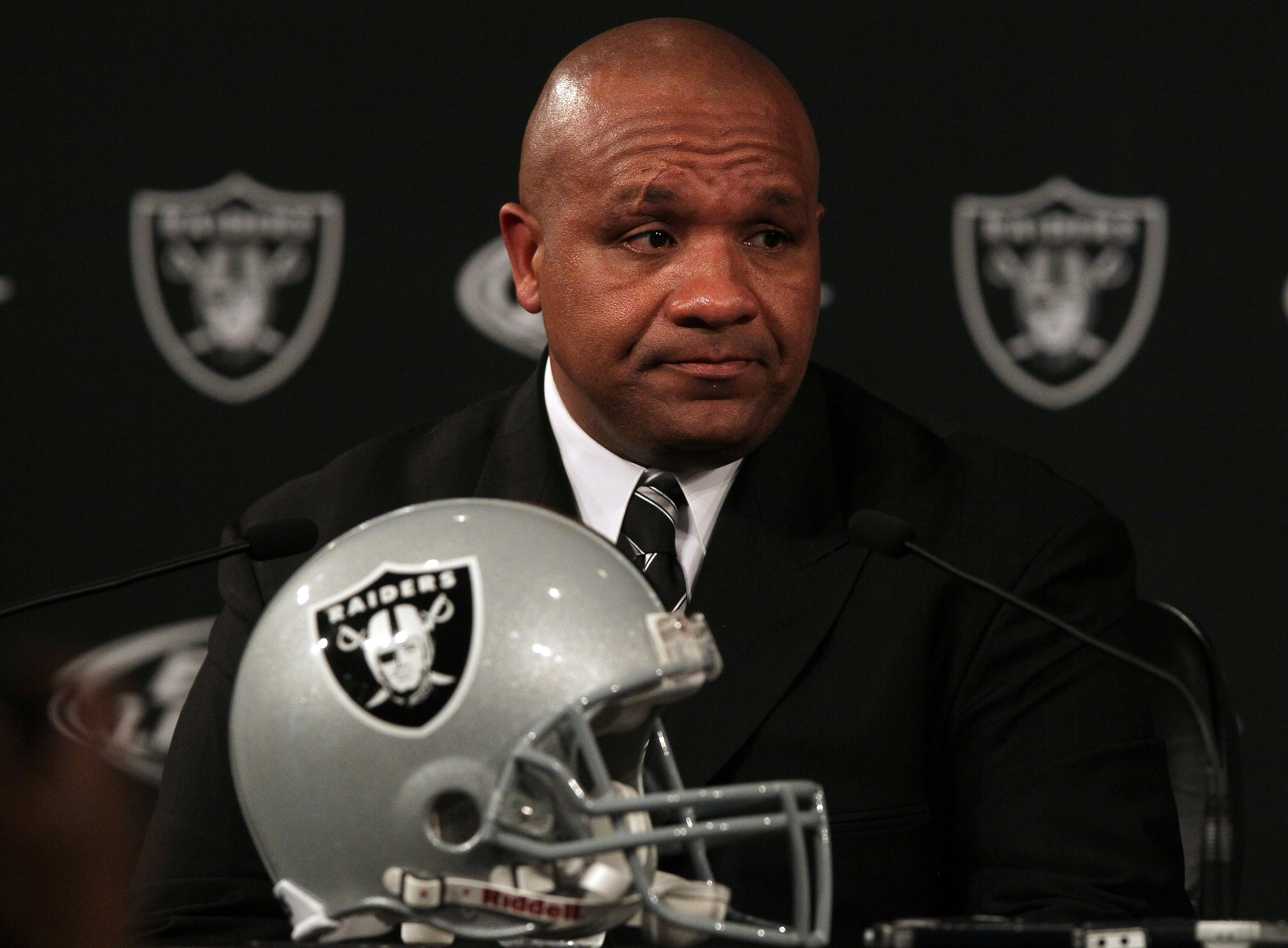 ALAMEDA, CA - JANUARY 18: New Oakland Raiders coach Hue Jackson pauses as he speaks to reporters during a press conference on January 18, 2011 in Alameda, California. Hue Jackson was introduced as the new coach of the Oakland Raiders, replacing the fired